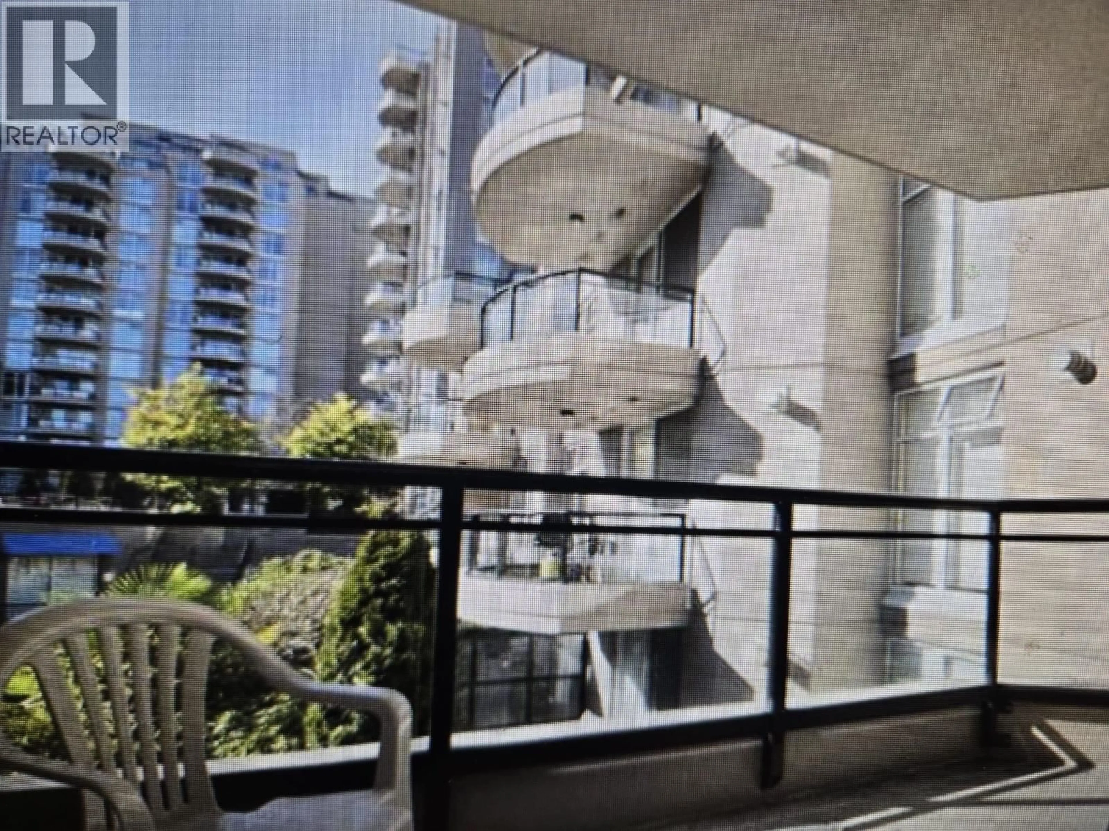 Balcony in the apartment, city buildings view from balcony for 213 - 8480 GRANVILLE AVENUE, Richmond British Columbia V6Y4E8