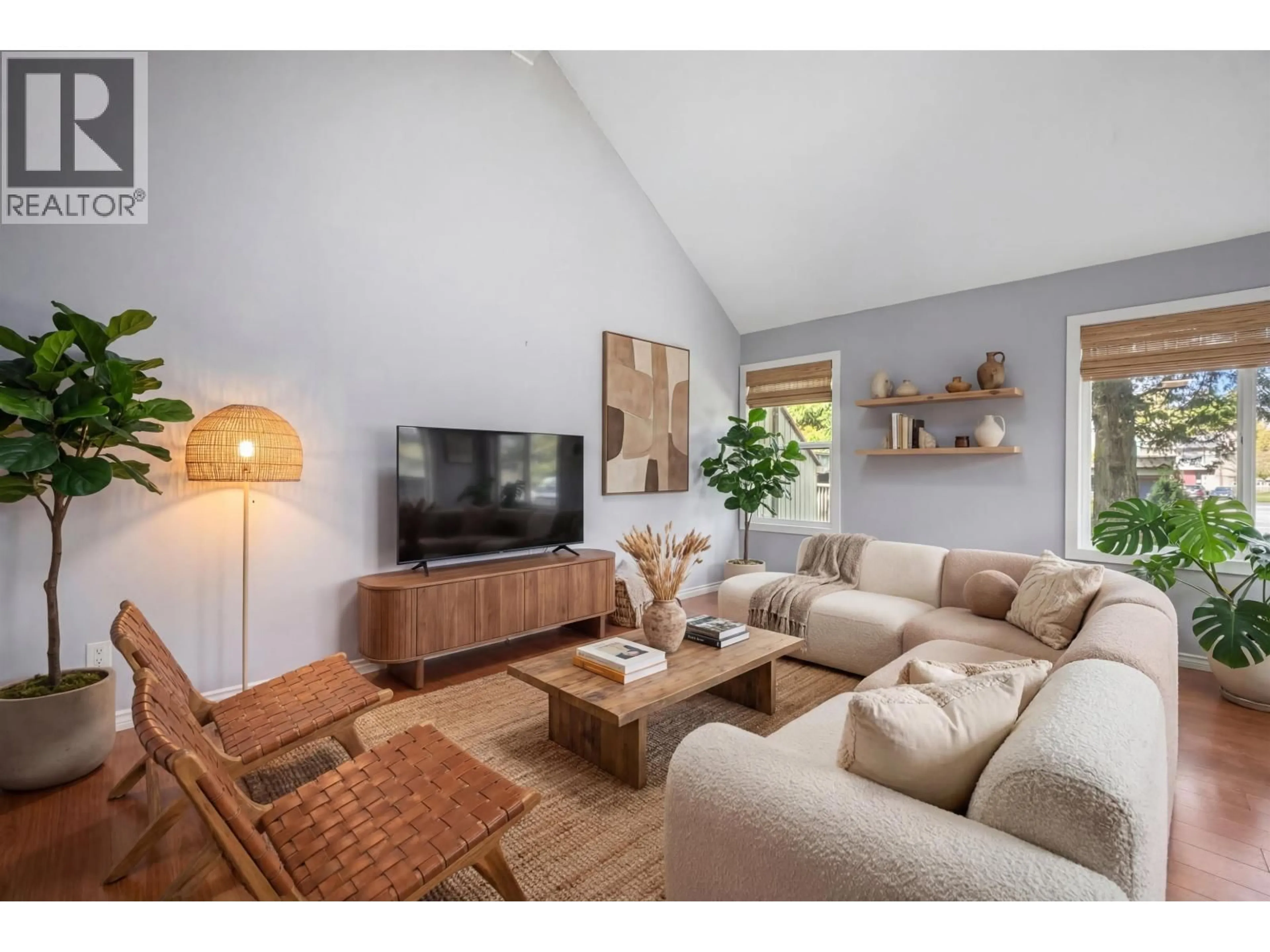 Living room with furniture, wood/laminate floor for 4725 CEDARGLEN PLACE, Burnaby British Columbia V5G4B6