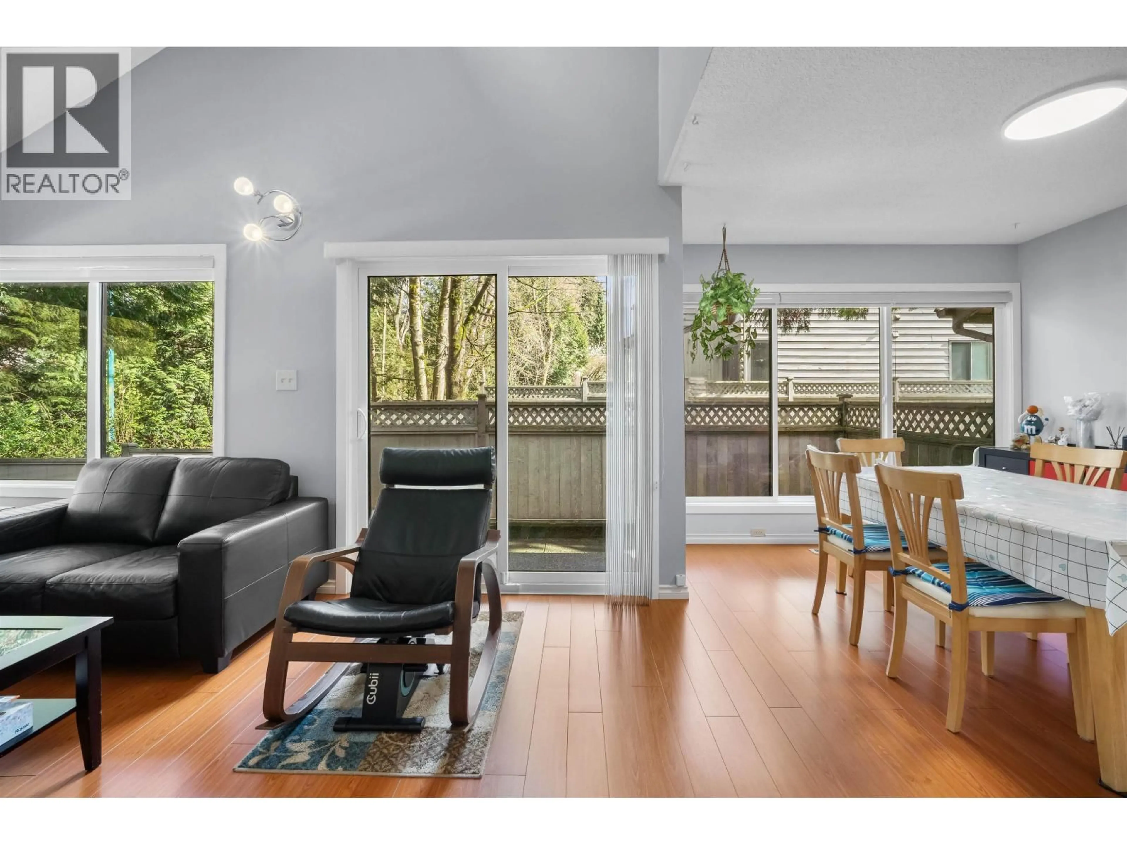 Living room with furniture, wood/laminate floor for 4725 CEDARGLEN PLACE, Burnaby British Columbia V5G4B6