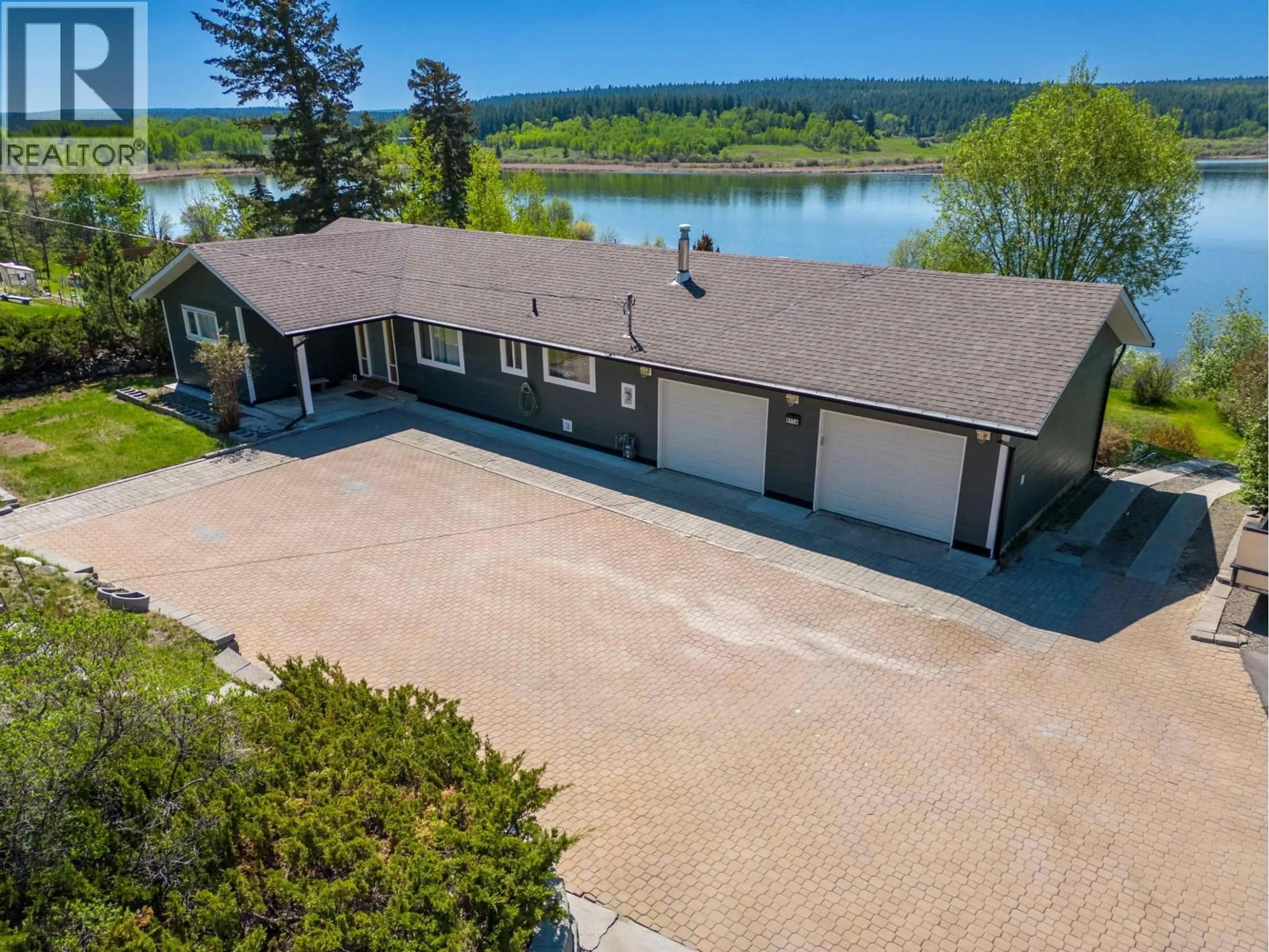 A pic from outside/outdoor area/front of a property/back of a property/a pic from drone, water/lake/river/ocean view for 4116 MCKINLEY DRIVE, Lac La Hache British Columbia V0K1T0