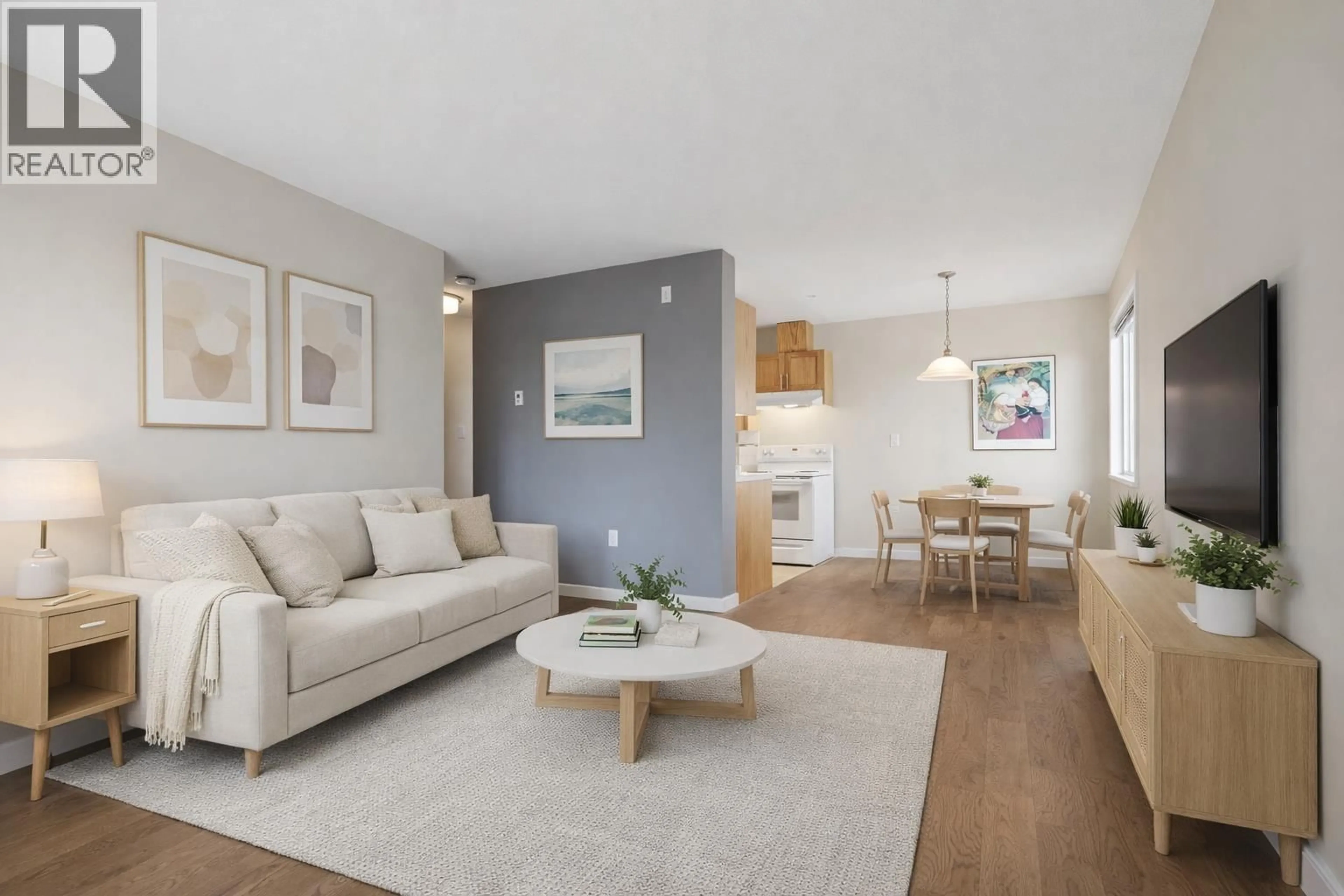 Living room with furniture, wood/laminate floor for 303 - 357 2ND STREET, North Vancouver British Columbia V7L1C6