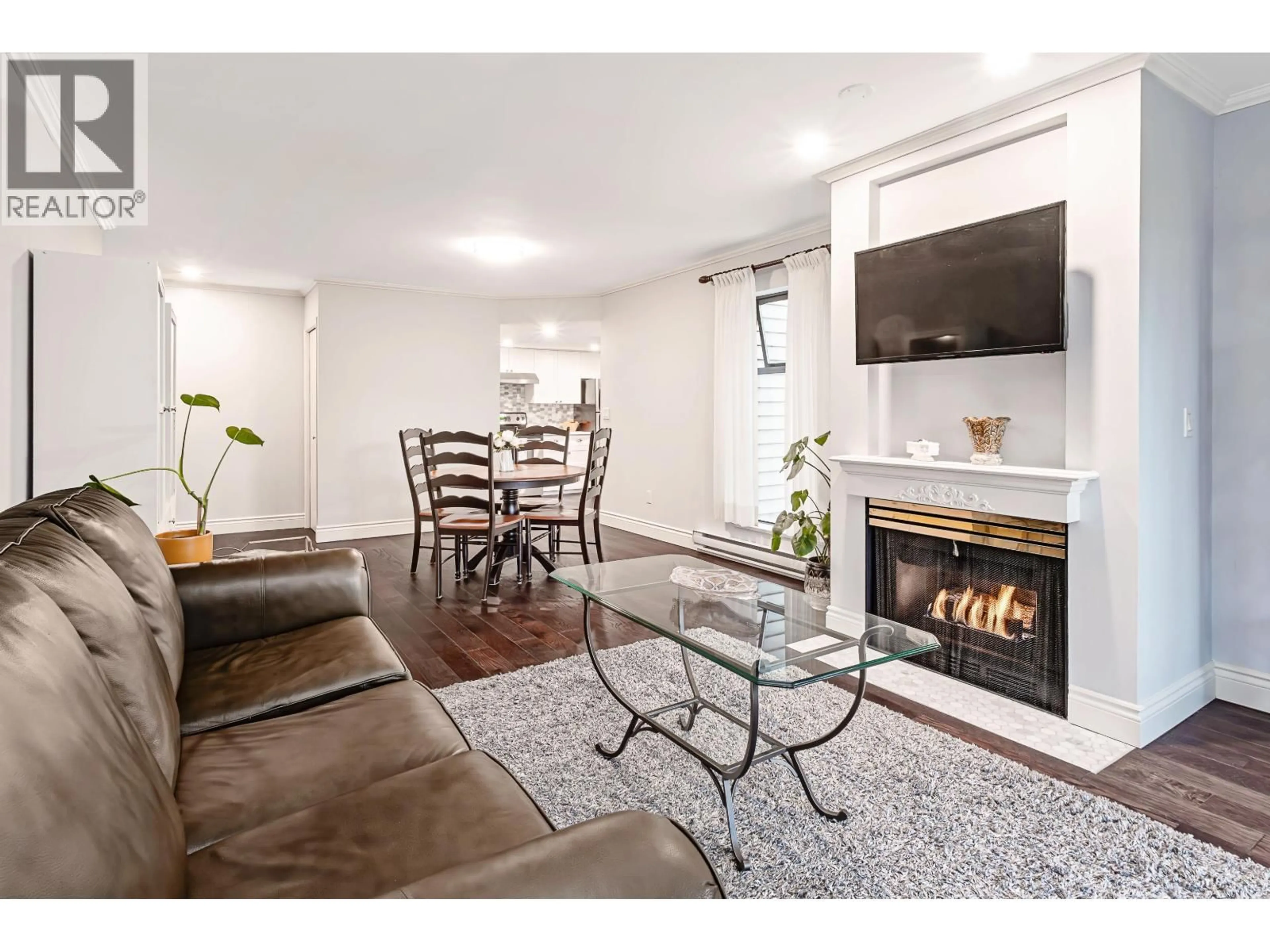 Living room with furniture, unknown for 305 - 2925 GLEN DRIVE, Coquitlam British Columbia V3B7H9