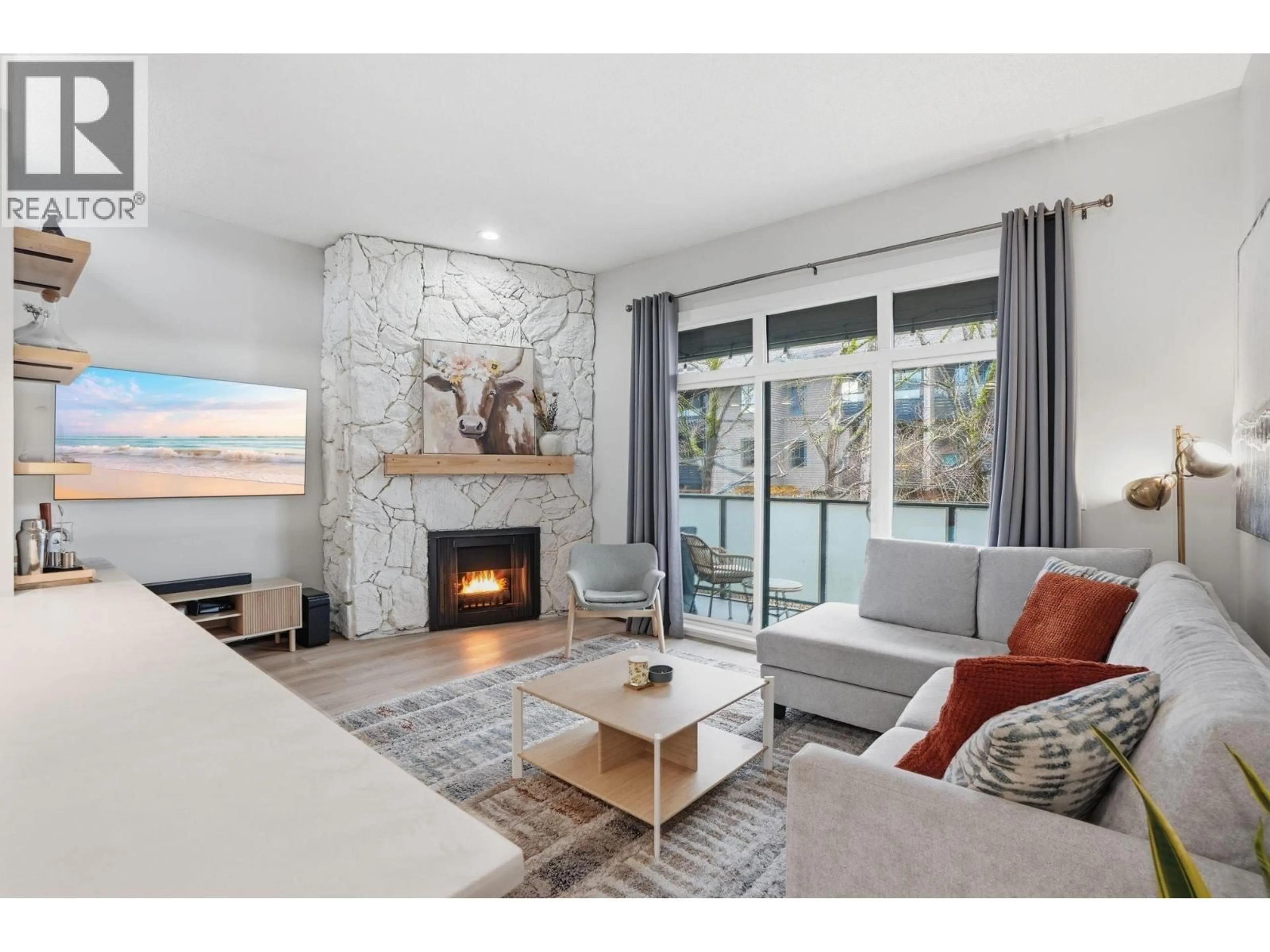 Living room with furniture, unknown for 303 - 1516 CHARLES STREET, Vancouver British Columbia V5L2T1