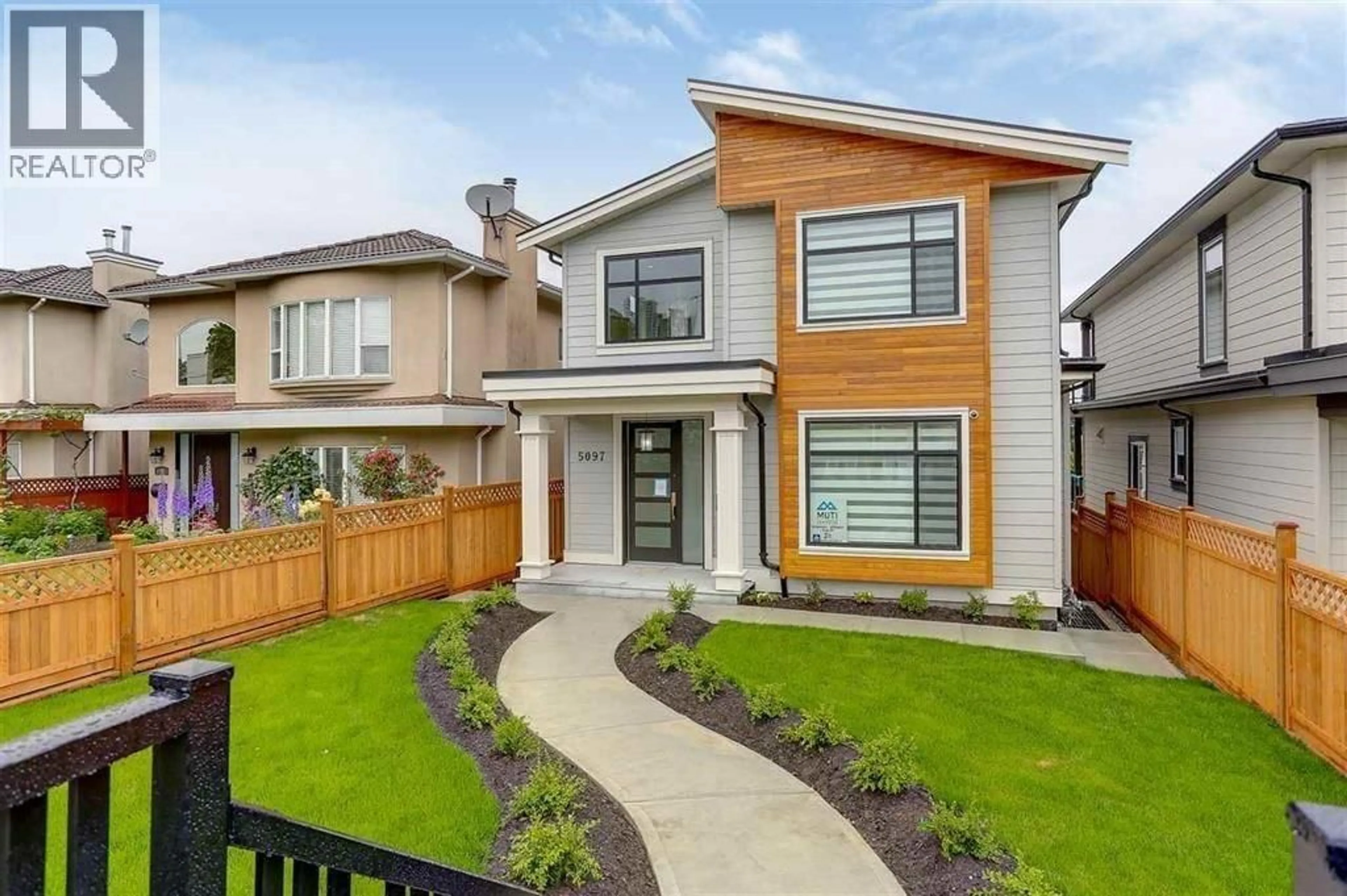 Home with vinyl exterior material, street for 5097 DOVER STREET, Burnaby British Columbia V5H1R4