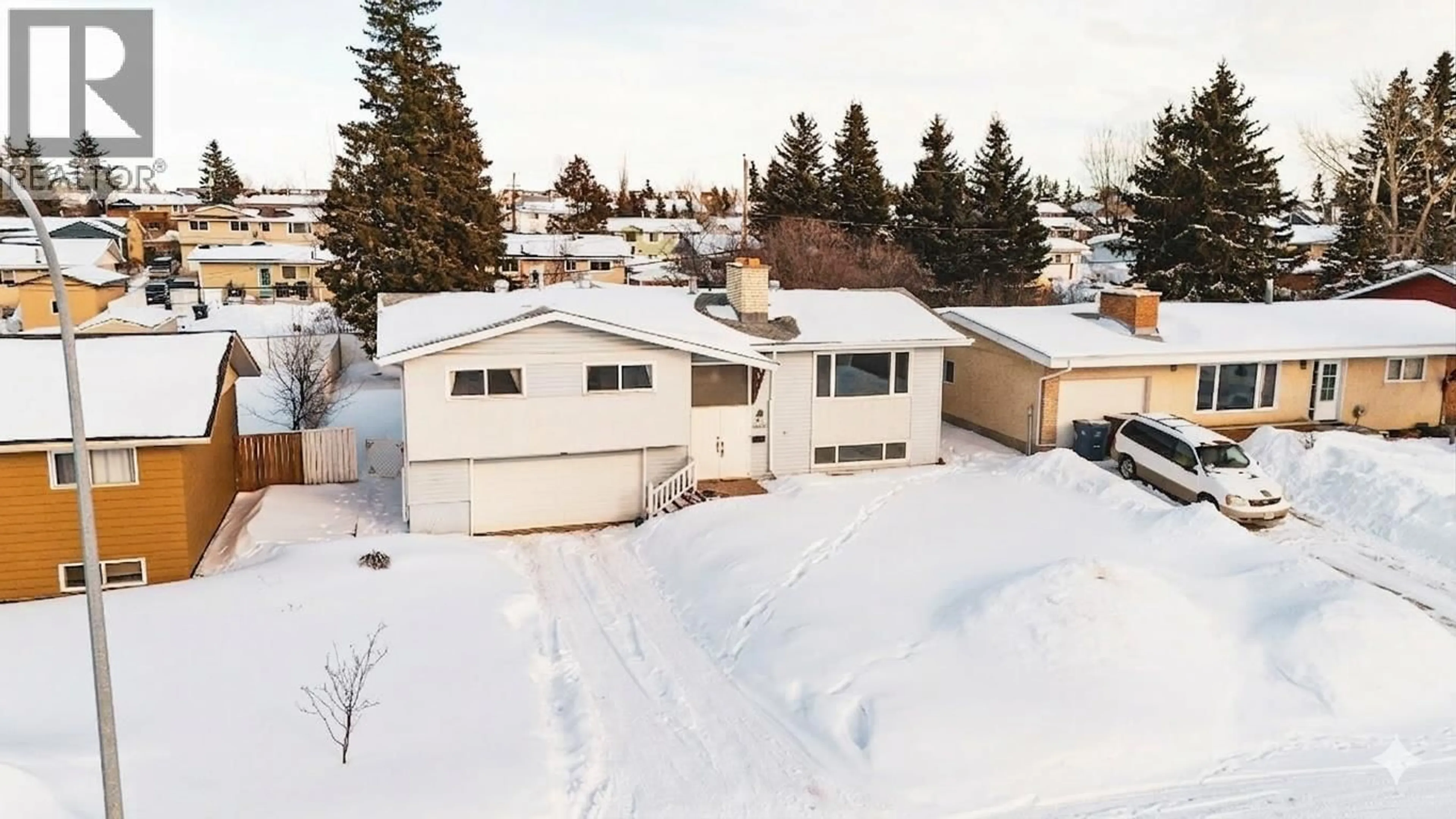 A pic from outside/outdoor area/front of a property/back of a property/a pic from drone, street for 11323 94 STREET, Fort St. John British Columbia V1J3M1