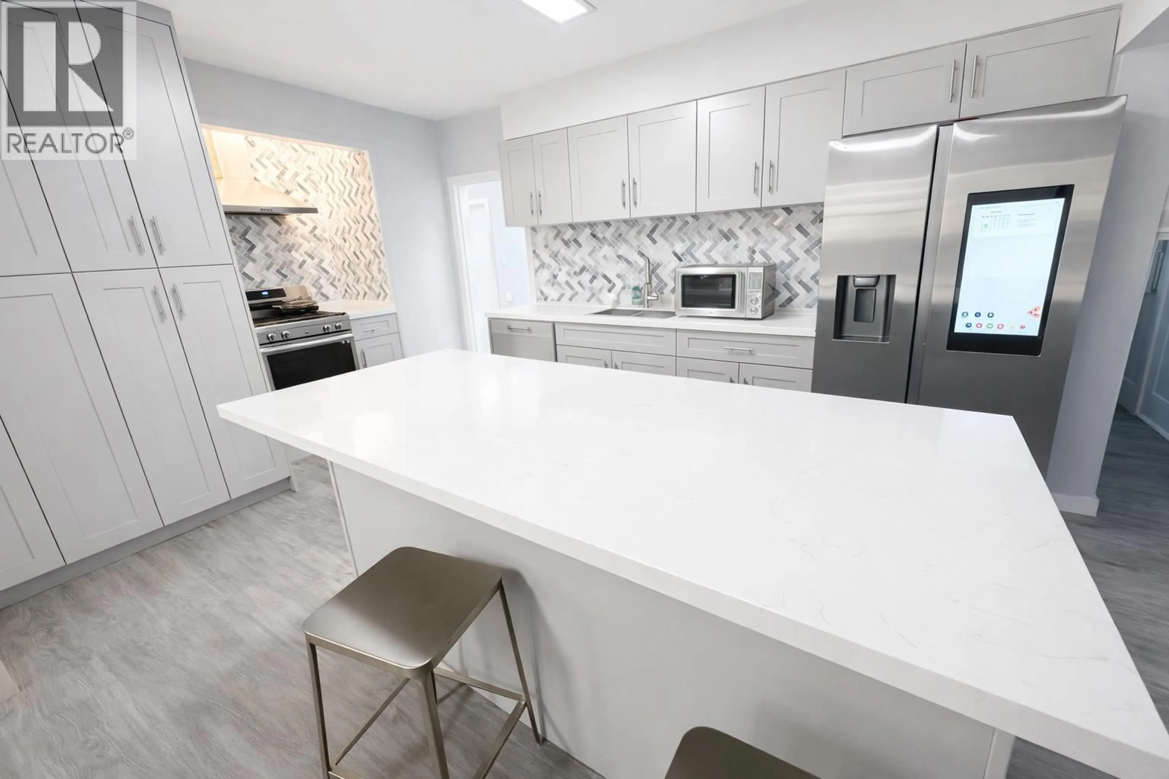 Contemporary kitchen, ceramic/tile floor for 4450 GRANVILLE STREET, Vancouver British Columbia V6H3L8