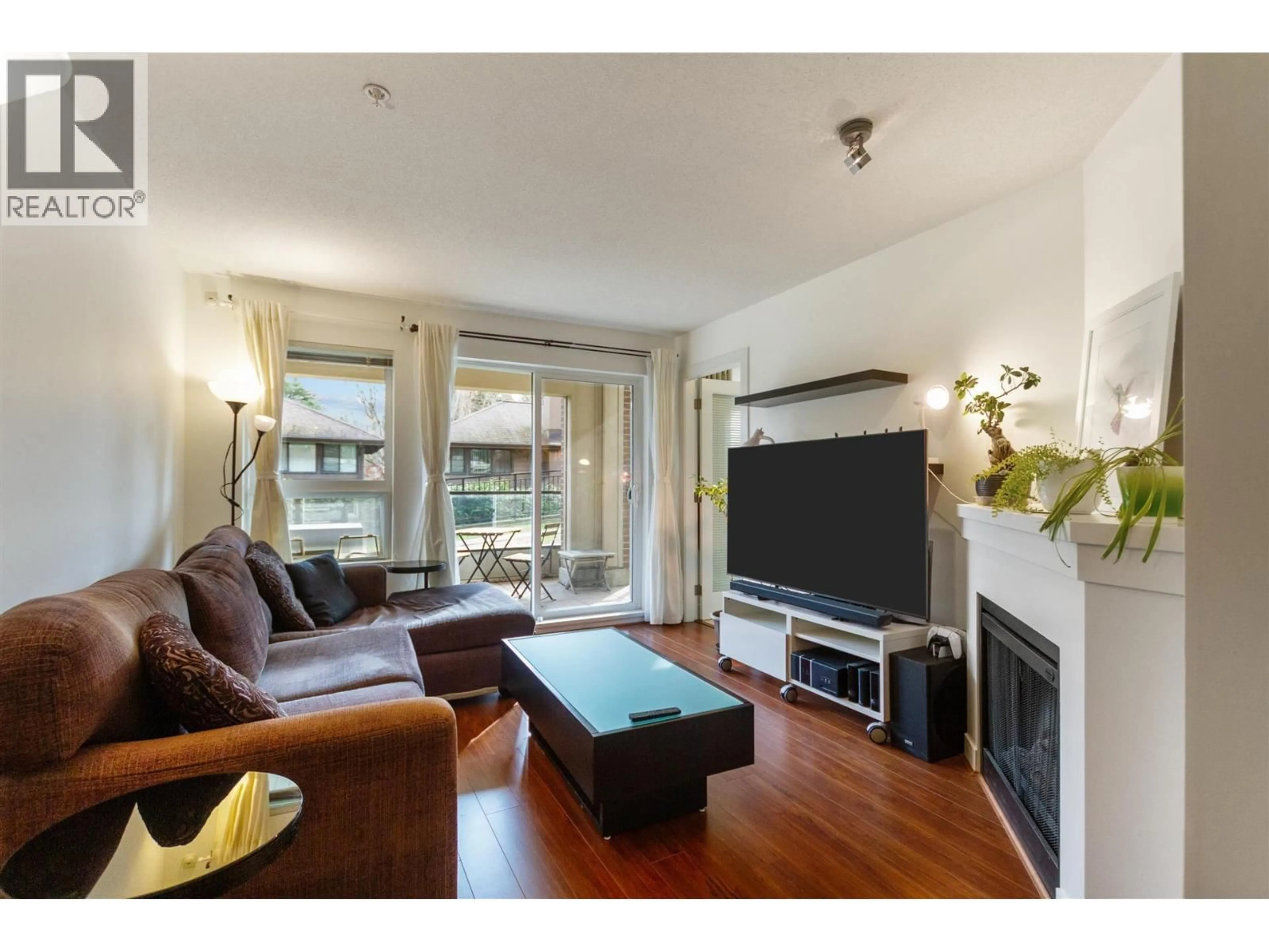 Living room with furniture, wood/laminate floor for 103 - 8600 PARK ROAD, Richmond British Columbia V6Y0C3