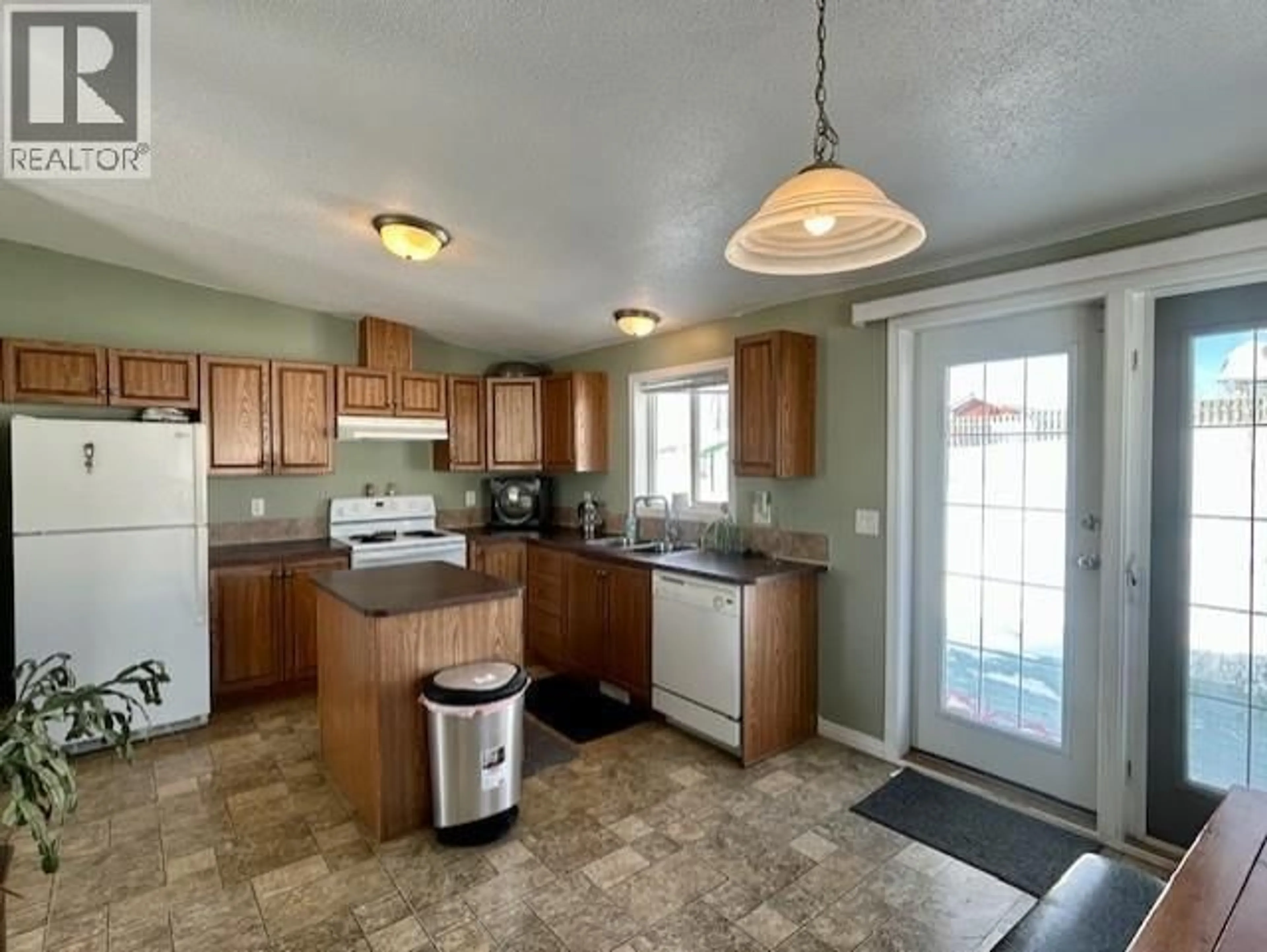 Open concept kitchen, unknown for 5017 46 STREET, Fort Nelson British Columbia V0C1R0