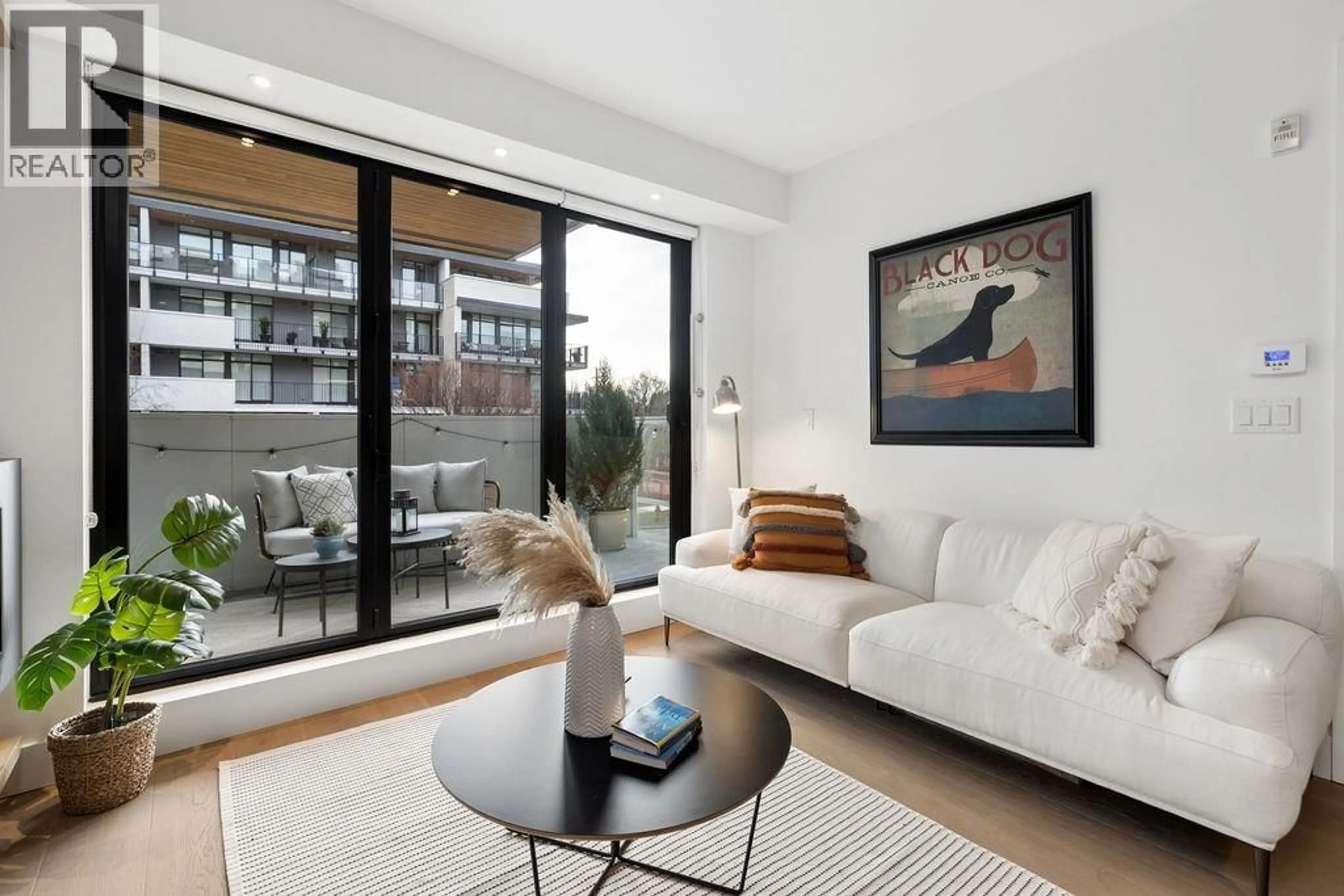 Living room with furniture, unknown for 205 - 5089 QUEBEC STREET, Vancouver British Columbia V5W0E5