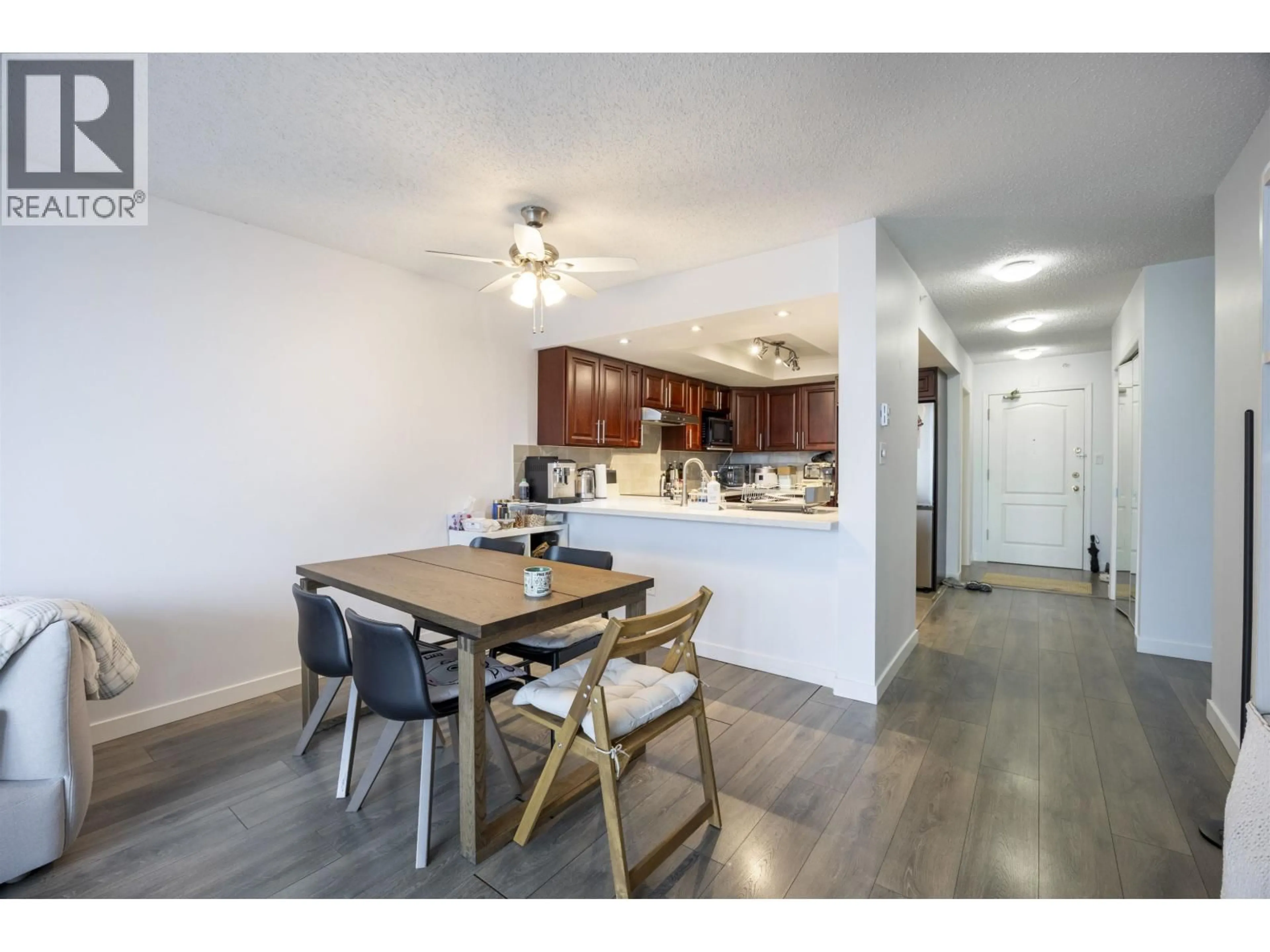 Open concept kitchen, wood/laminate floor for 1004 - 1190 PIPELINE ROAD, Coquitlam British Columbia V3B7T9