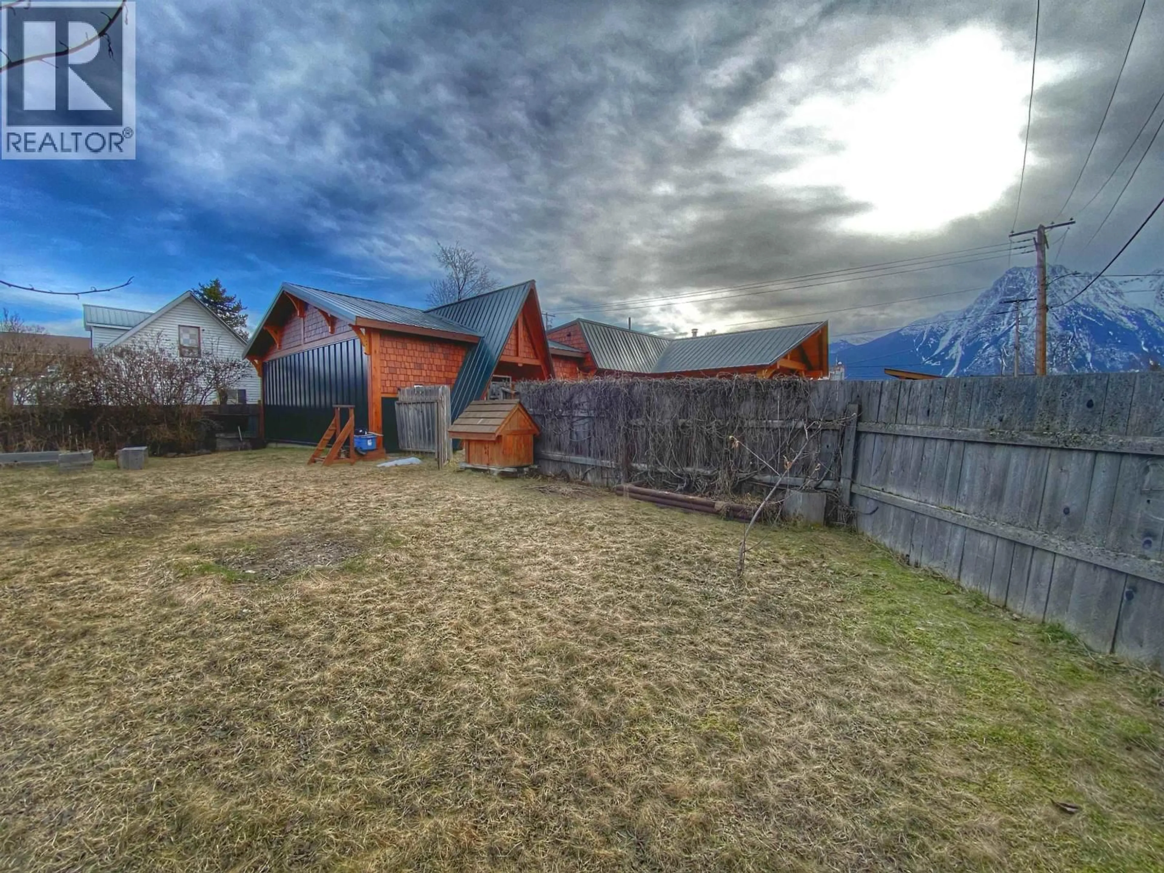A pic from outside/outdoor area/front of a property/back of a property/a pic from drone, mountain view for 1505 HANKIN STREET, Hazelton British Columbia V0J1Y0