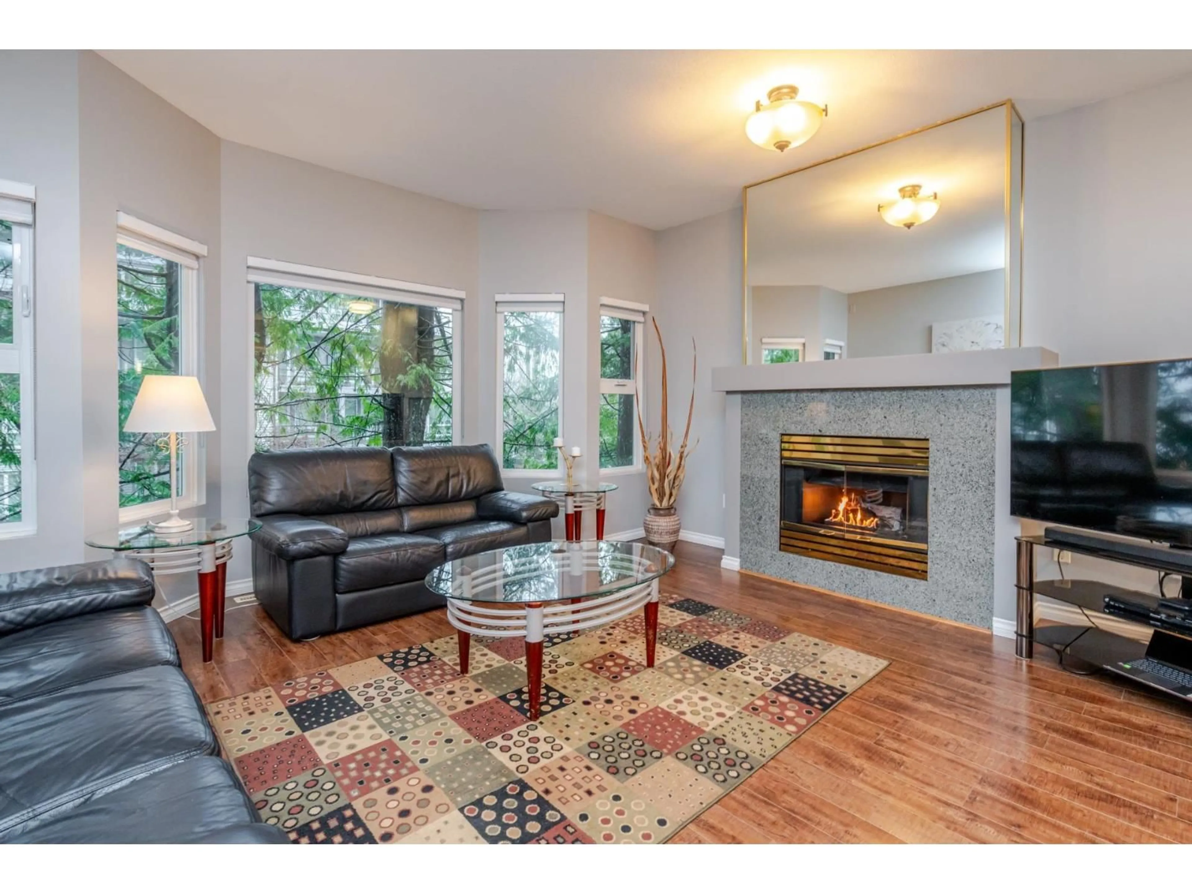 Living room with furniture, wood/laminate floor for 10 - 10340 156 STREET, Surrey British Columbia V3R4L8