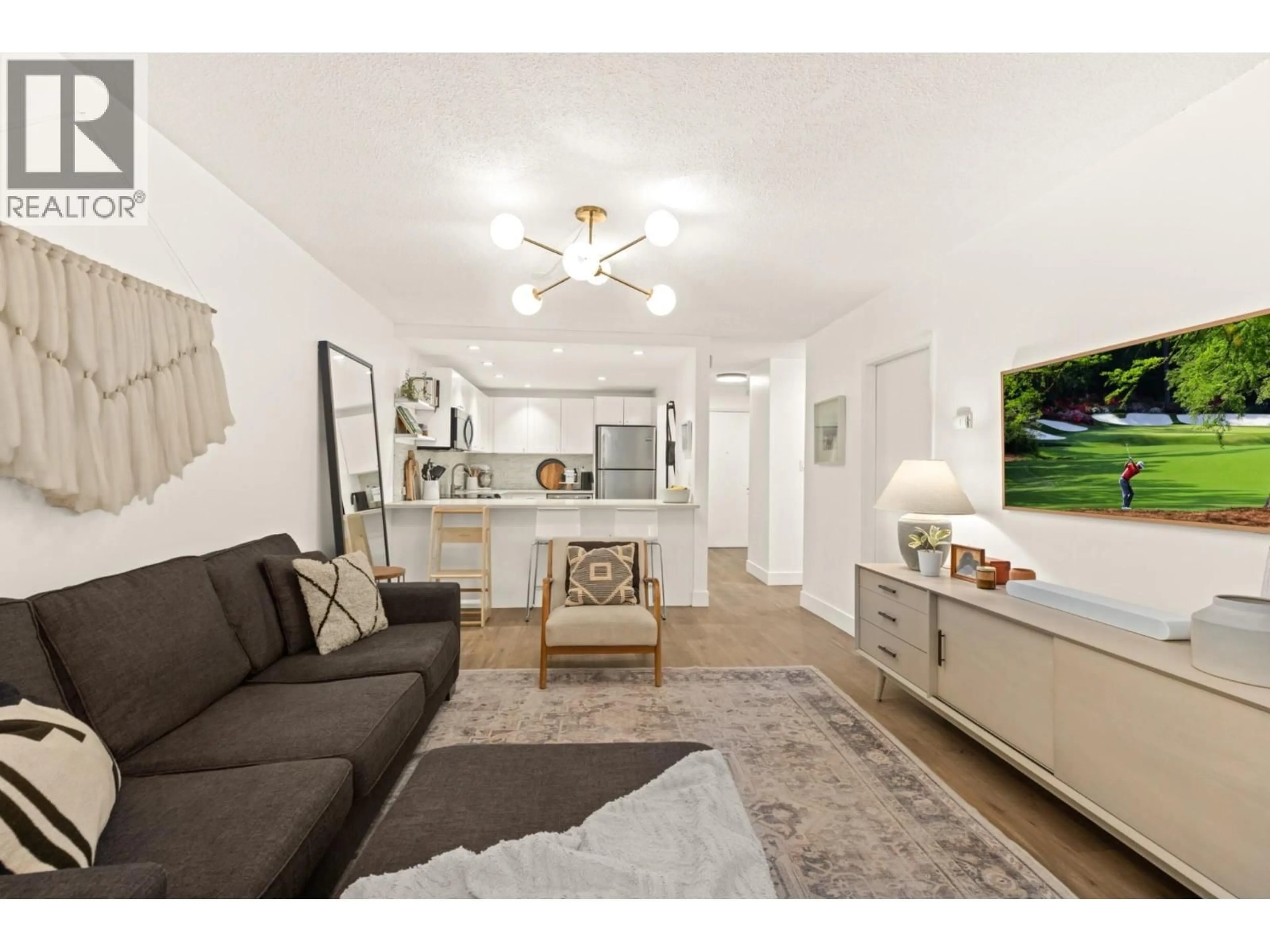 Living room with furniture, unknown for 101 - 621 6 AVENUE, Vancouver British Columbia V5T4H3