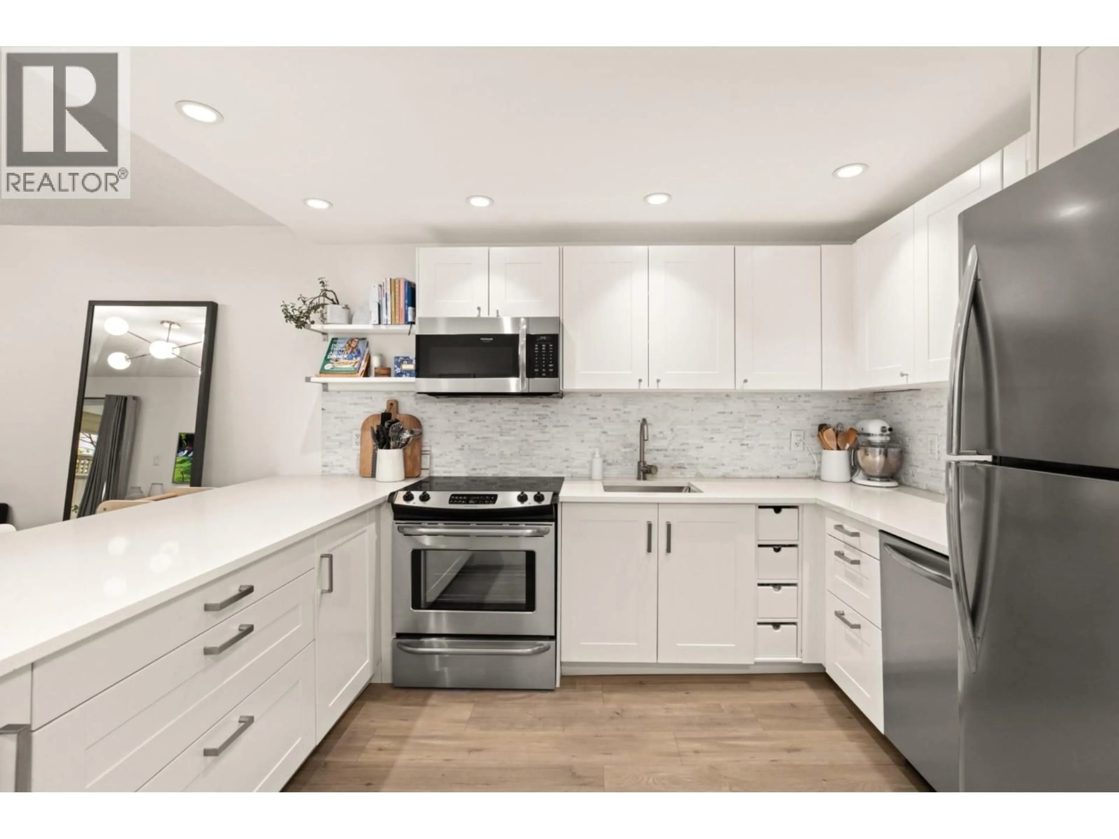 Open concept kitchen, unknown for 101 - 621 6 AVENUE, Vancouver British Columbia V5T4H3