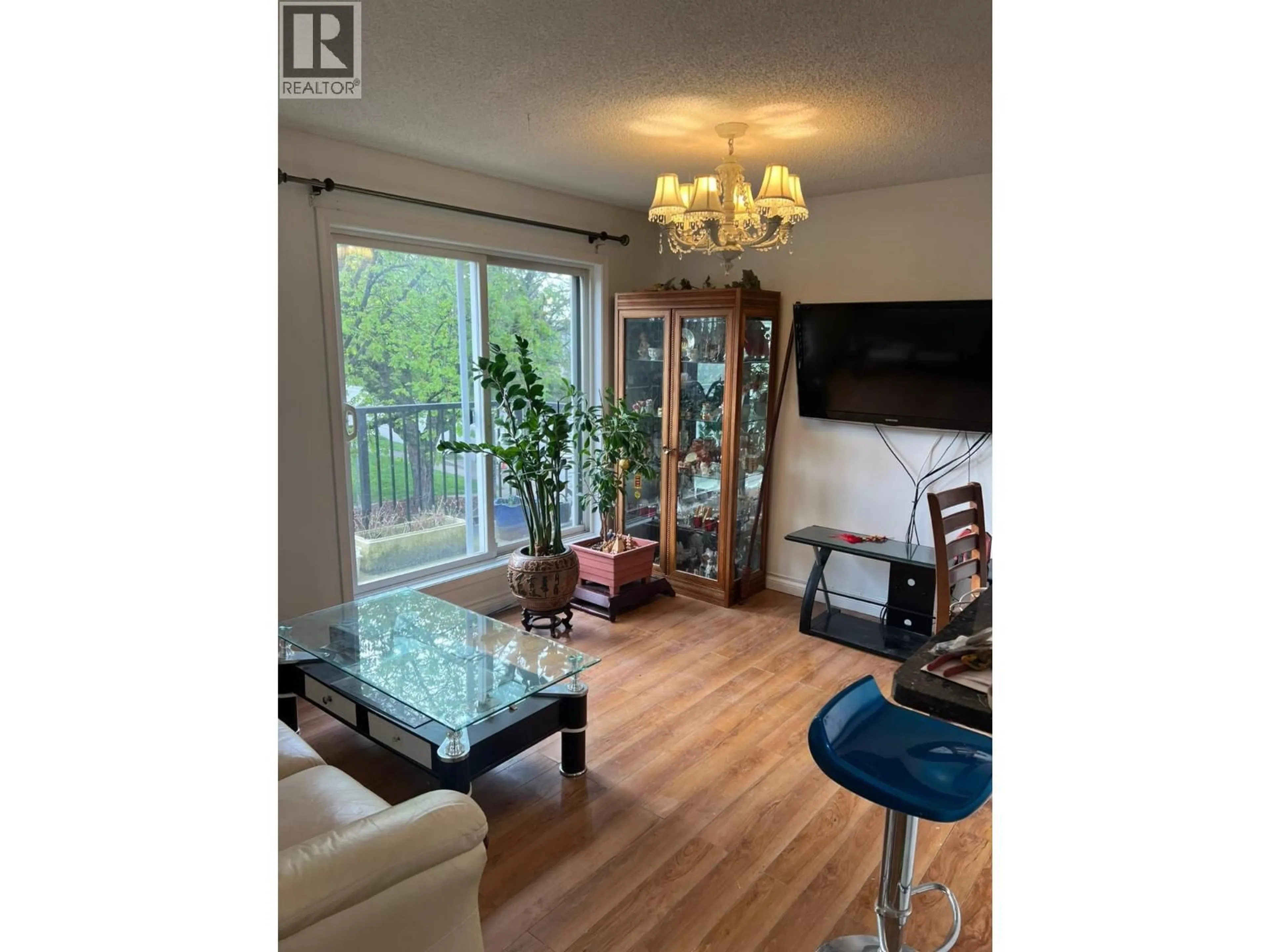 Living room with furniture, wood/laminate floor for 408 - 1040 BROADWAY, Vancouver British Columbia V5T4N7