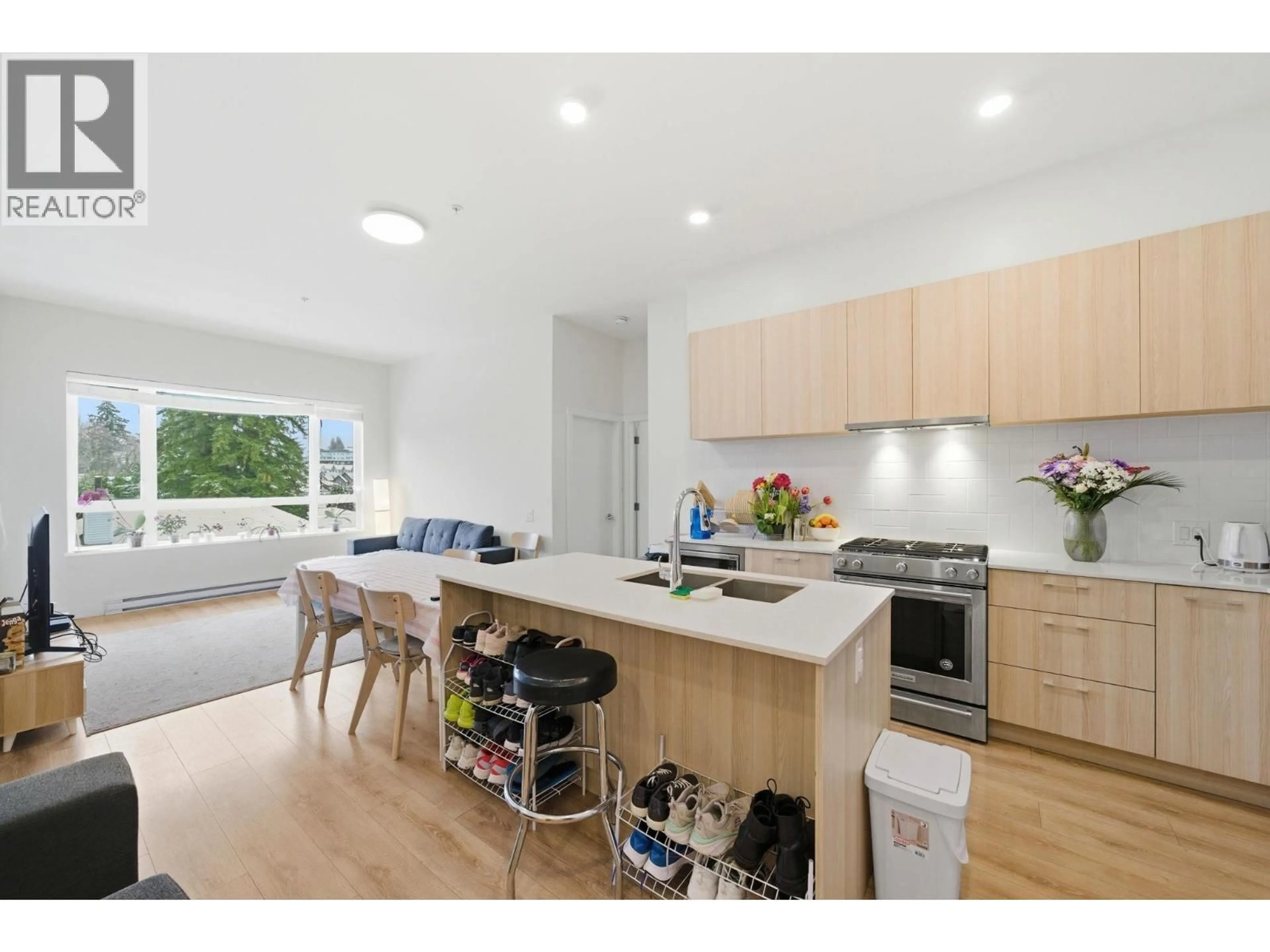 Open concept kitchen, wood/laminate floor for 408 - 721 ANSKAR COURT, Coquitlam British Columbia V3J0L4