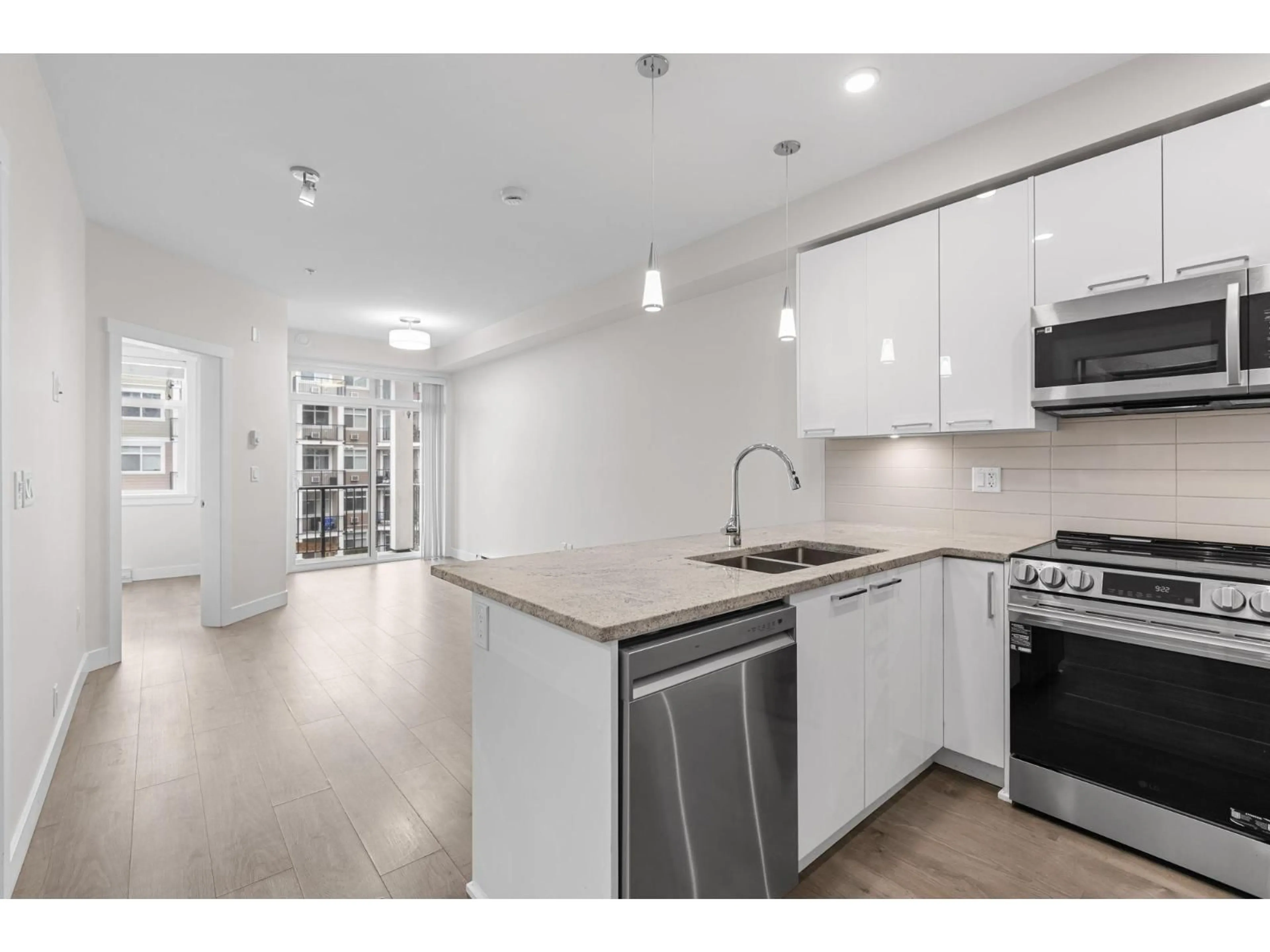 Open concept kitchen, unknown for 313 - 20696 EASTLEIGH CRESCENT, Langley British Columbia V3A0M3