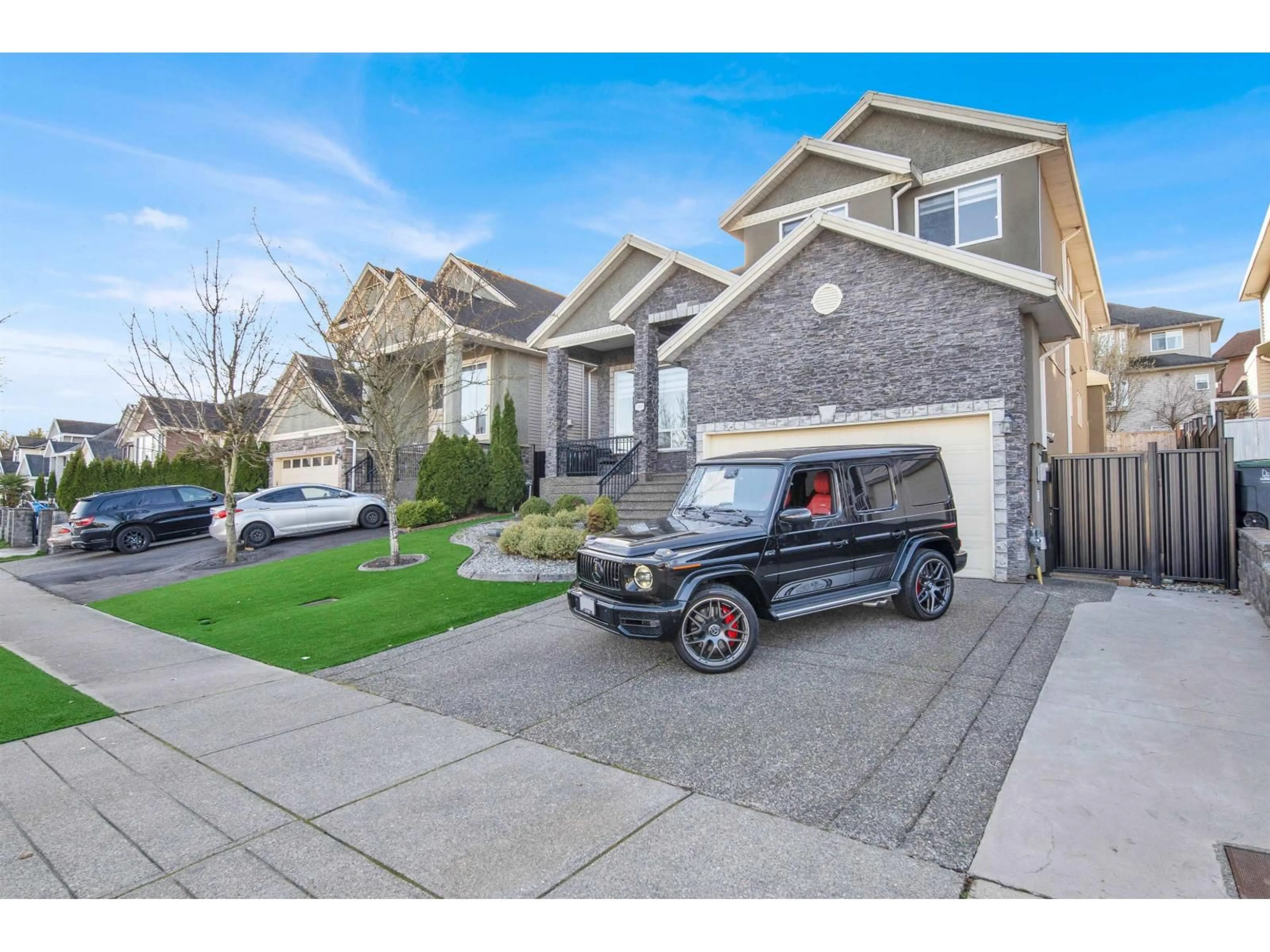 Home with vinyl exterior material, street for 7105 150A STREET, Surrey British Columbia V3S2E2