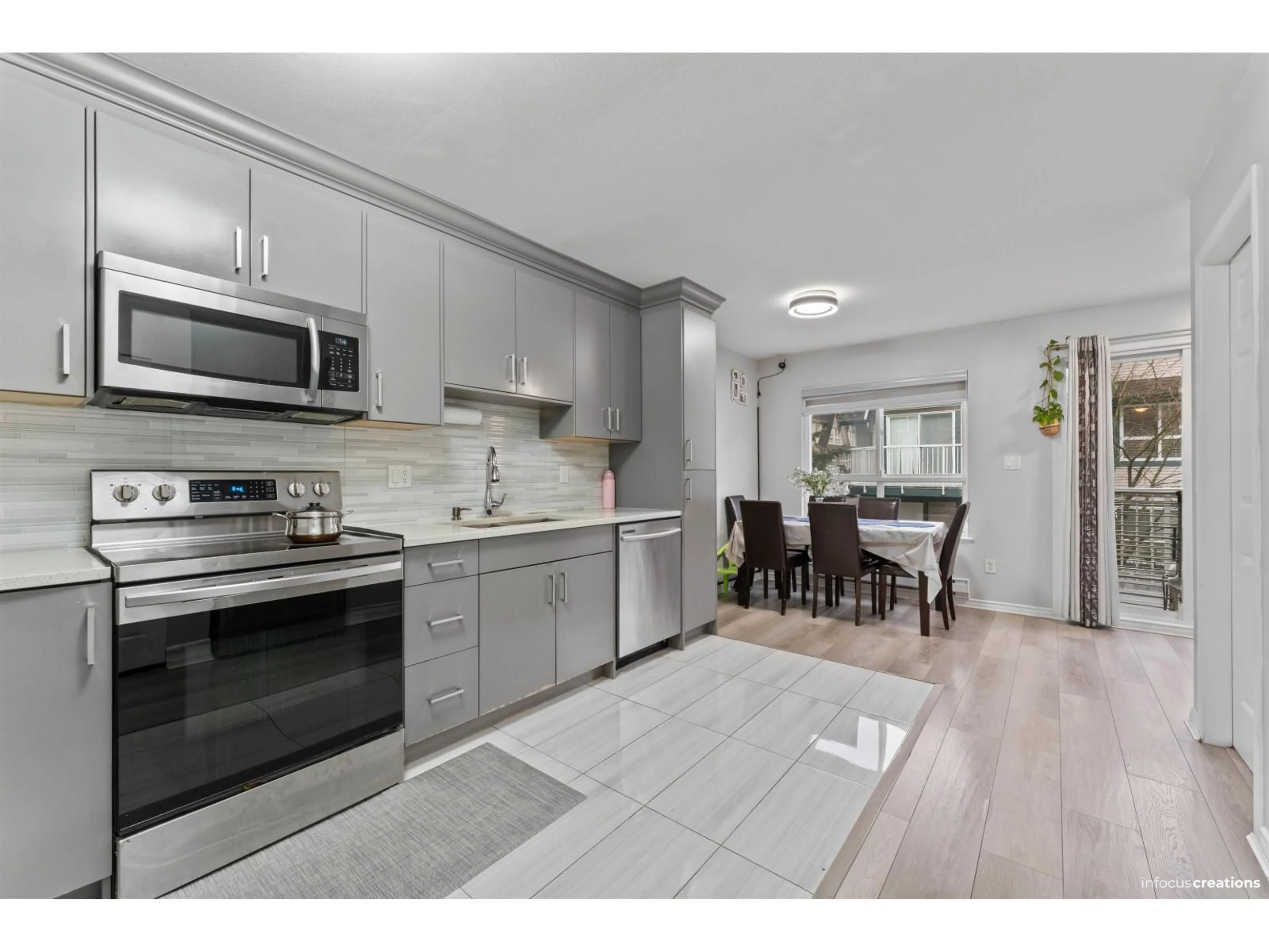 Open concept kitchen, unknown for 9 - 12730 66 AVENUE, Surrey British Columbia V3W1P3