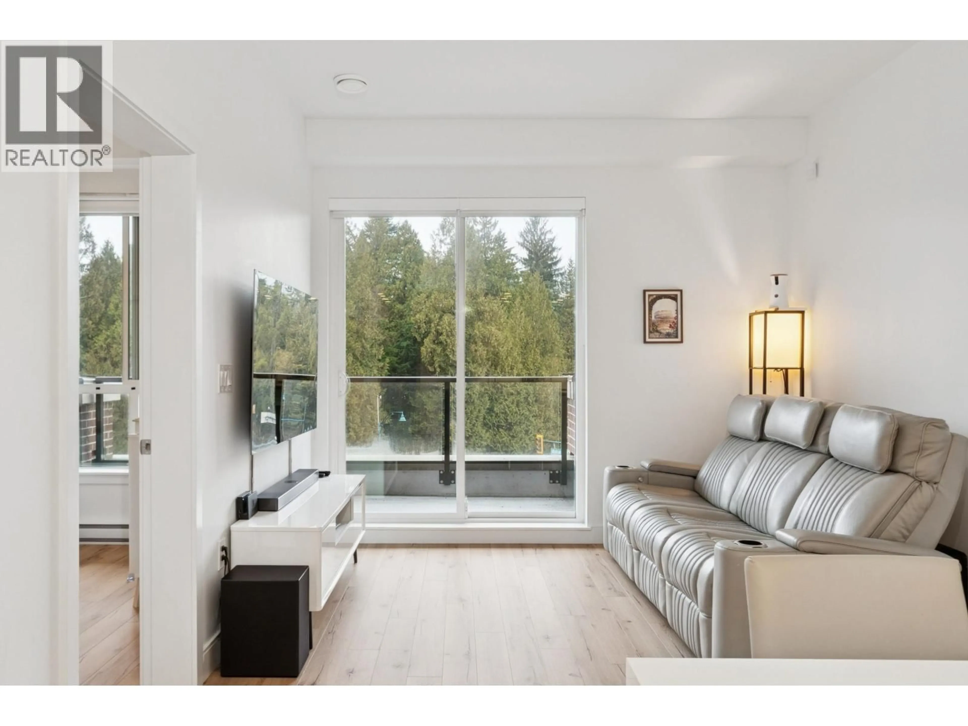Living room with furniture, wood/laminate floor for 420 - 55 KLAHANIE DRIVE, Port Moody British Columbia V3H0M9