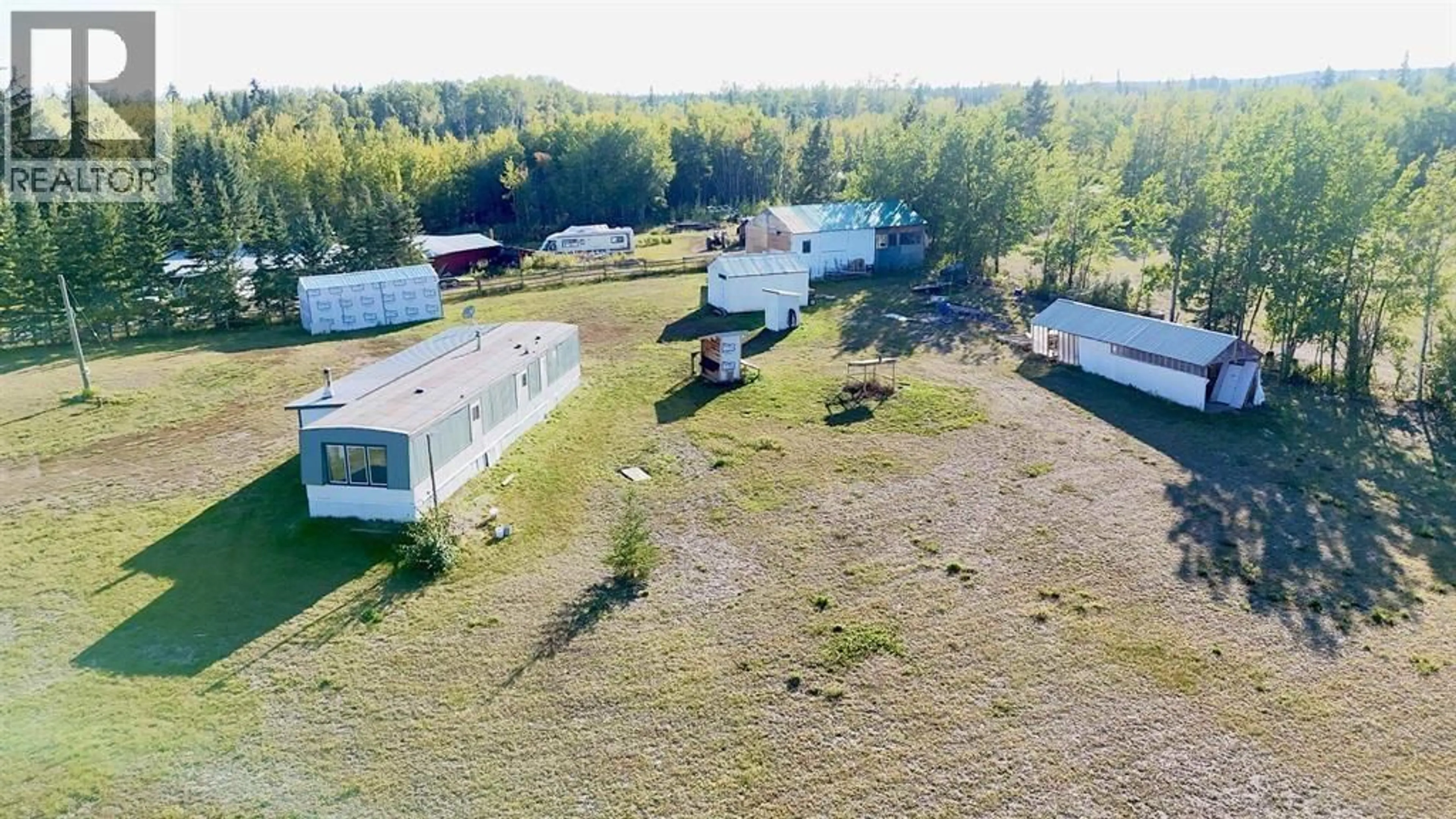 A pic from outside/outdoor area/front of a property/back of a property/a pic from drone, building for 693 OAK ROAD, Vanderhoof British Columbia V0J3A2