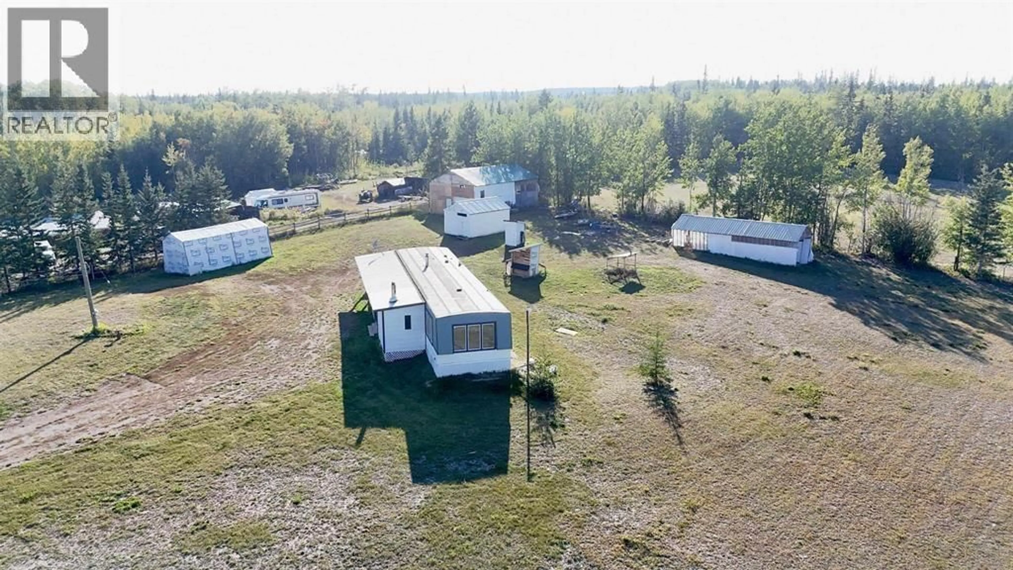 A pic from outside/outdoor area/front of a property/back of a property/a pic from drone, building for 693 OAK ROAD, Vanderhoof British Columbia V0J3A2