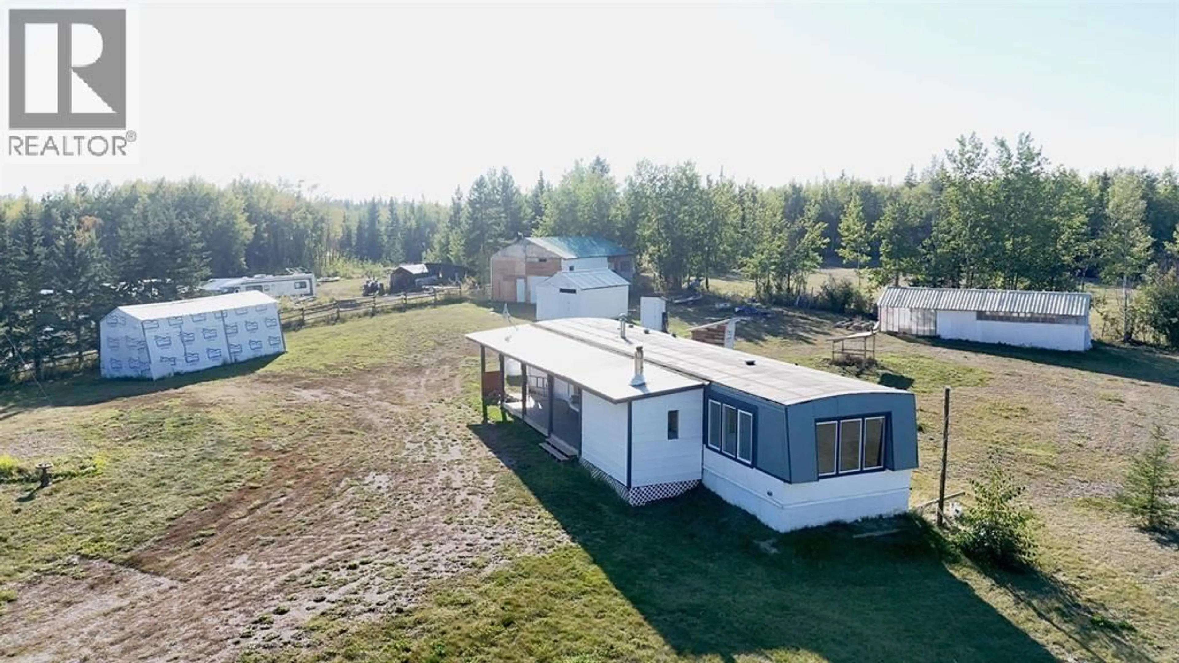 A pic from outside/outdoor area/front of a property/back of a property/a pic from drone, building for 693 OAK ROAD, Vanderhoof British Columbia V0J3A2