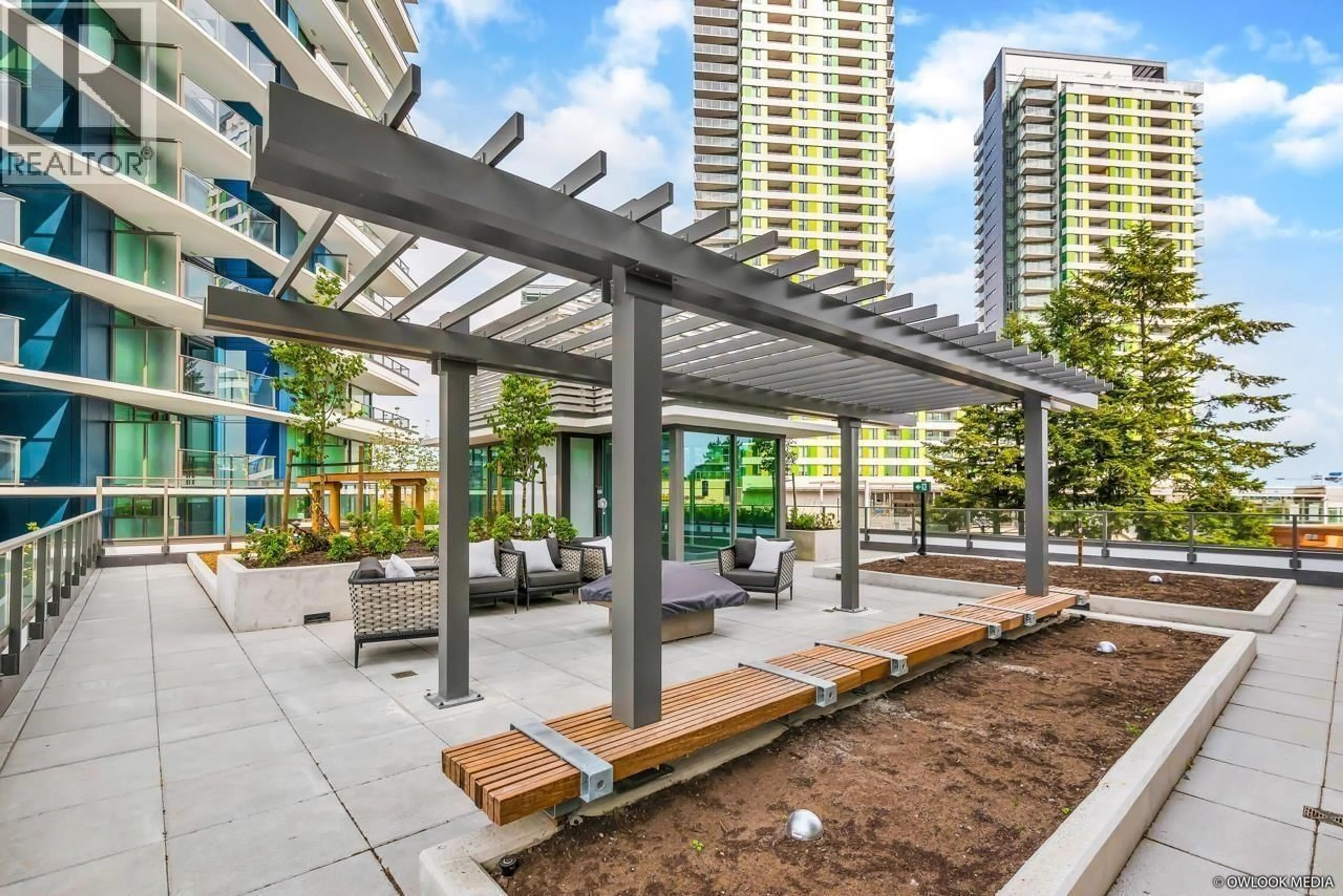 Patio, city buildings view from balcony for 408 - 8238 LORD STREET, Vancouver British Columbia V6P0G7