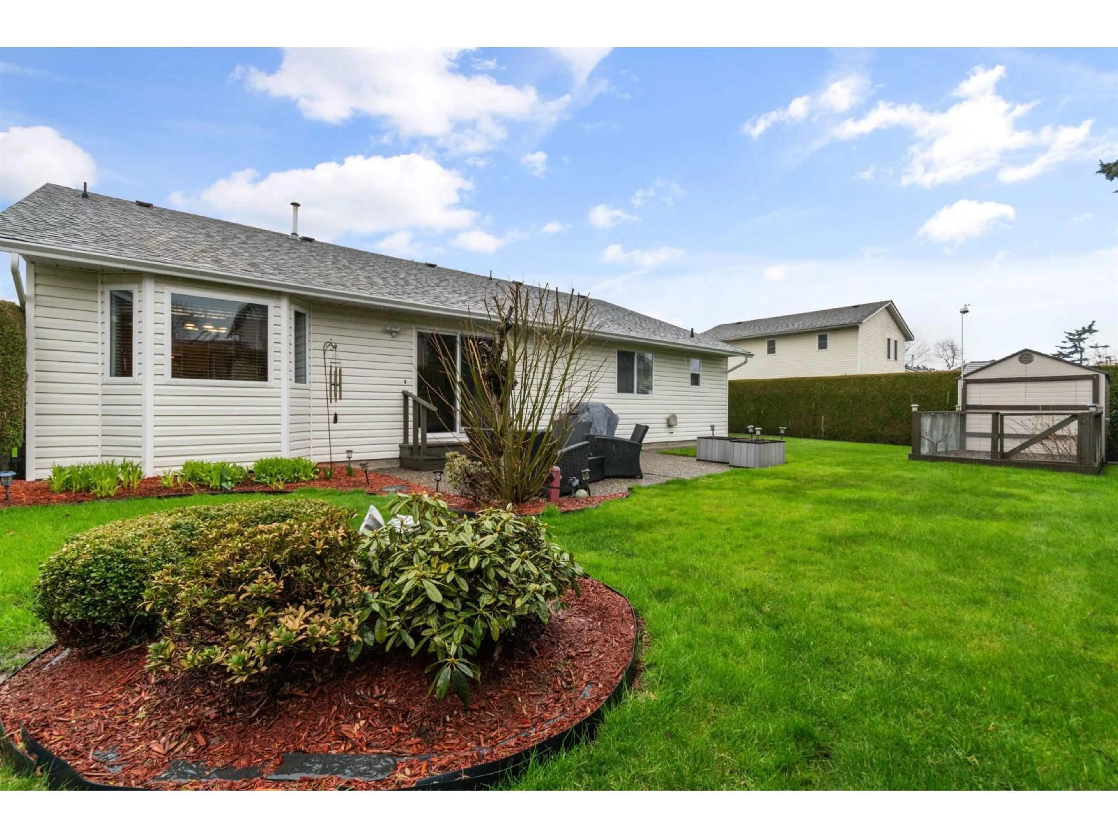 Home with vinyl exterior material, street for 6944 COACH LAMP DRIVE, Chilliwack British Columbia V2R2X6