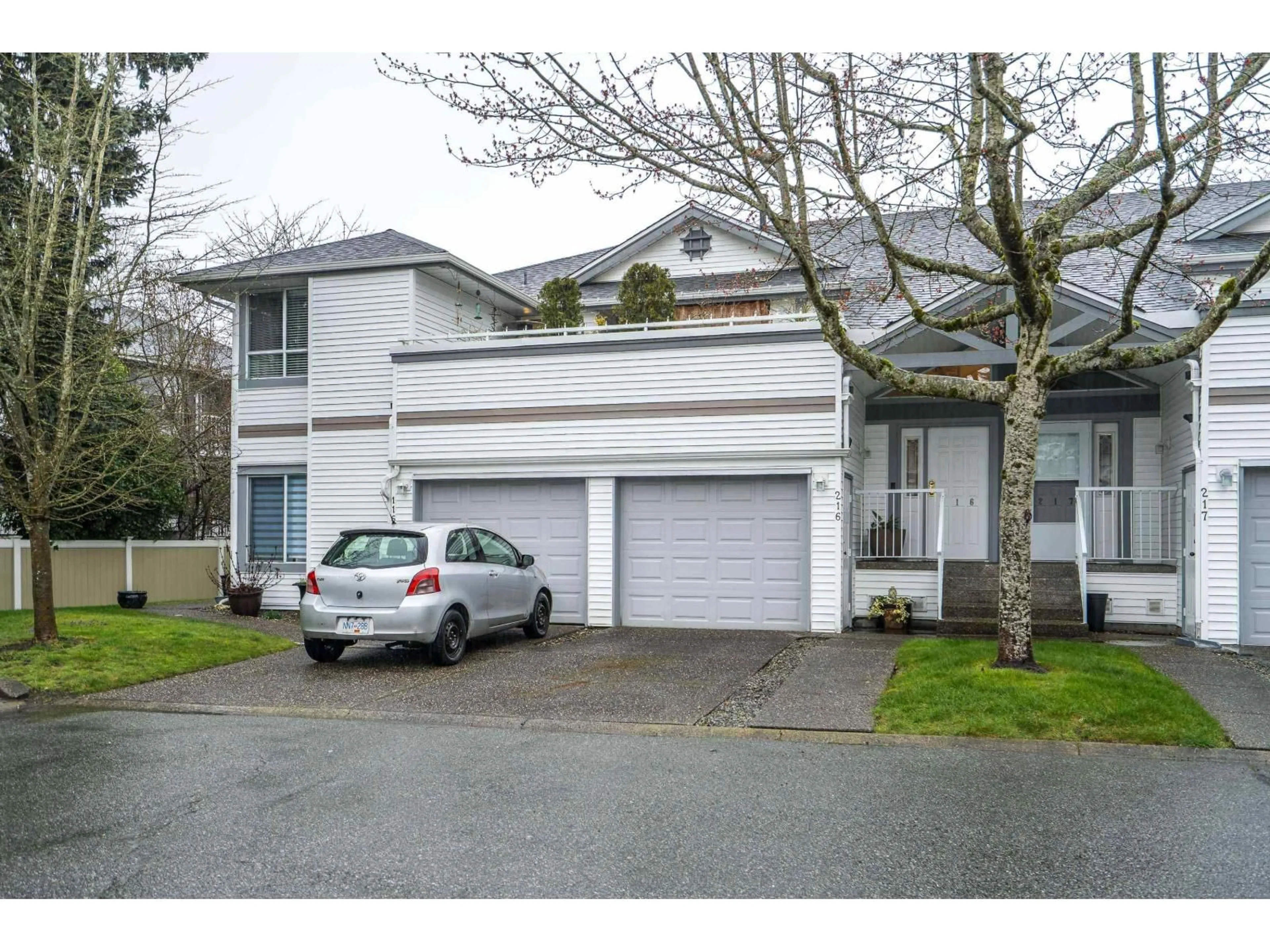 A pic from outside/outdoor area/front of a property/back of a property/a pic from drone, street for 216 - 13895 102 AVENUE, Surrey British Columbia V3T1P2