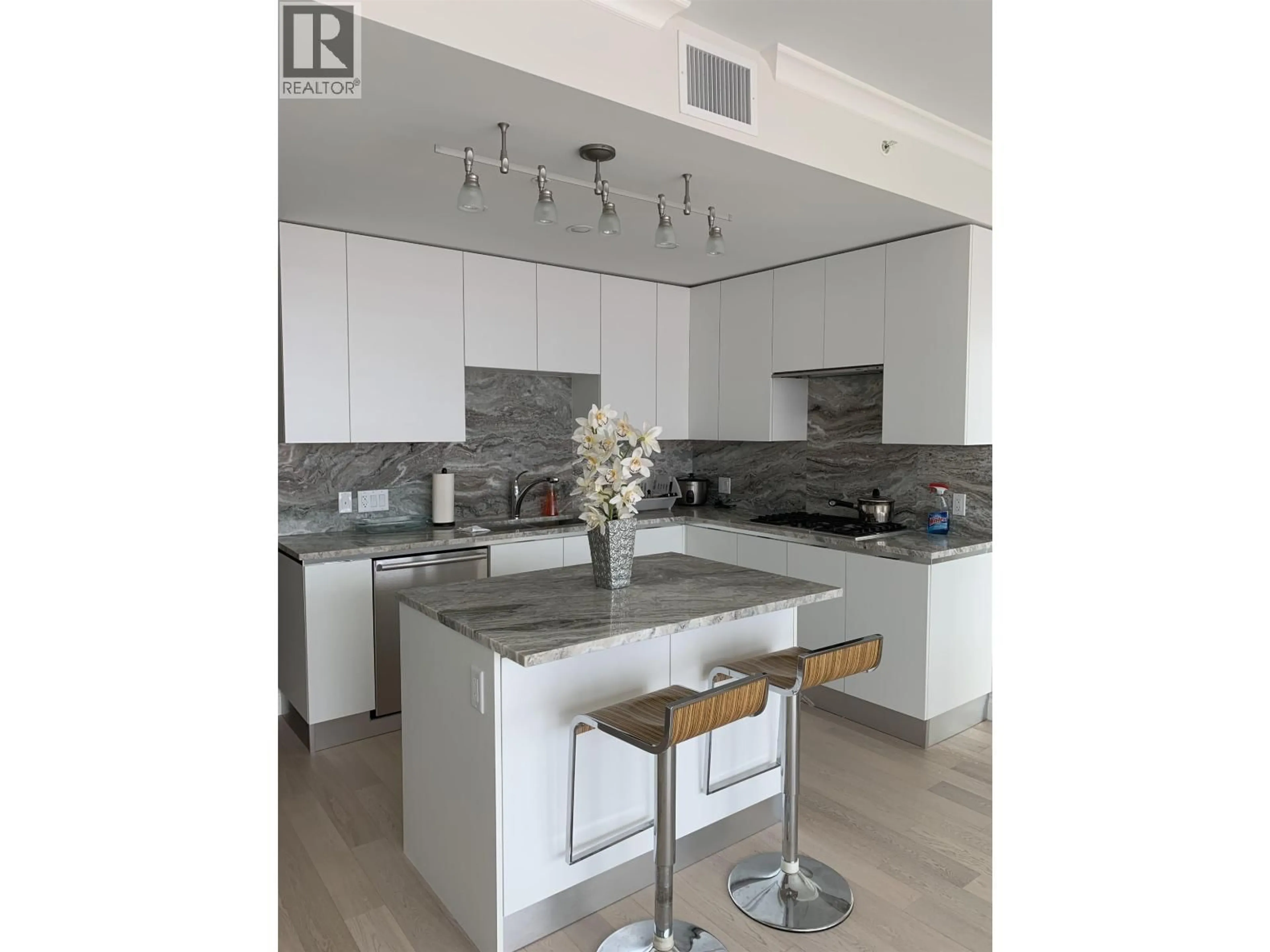 Open concept kitchen, unknown for 807 - 175 VICTORY SHIP WAY, Vancouver British Columbia V7L0G1