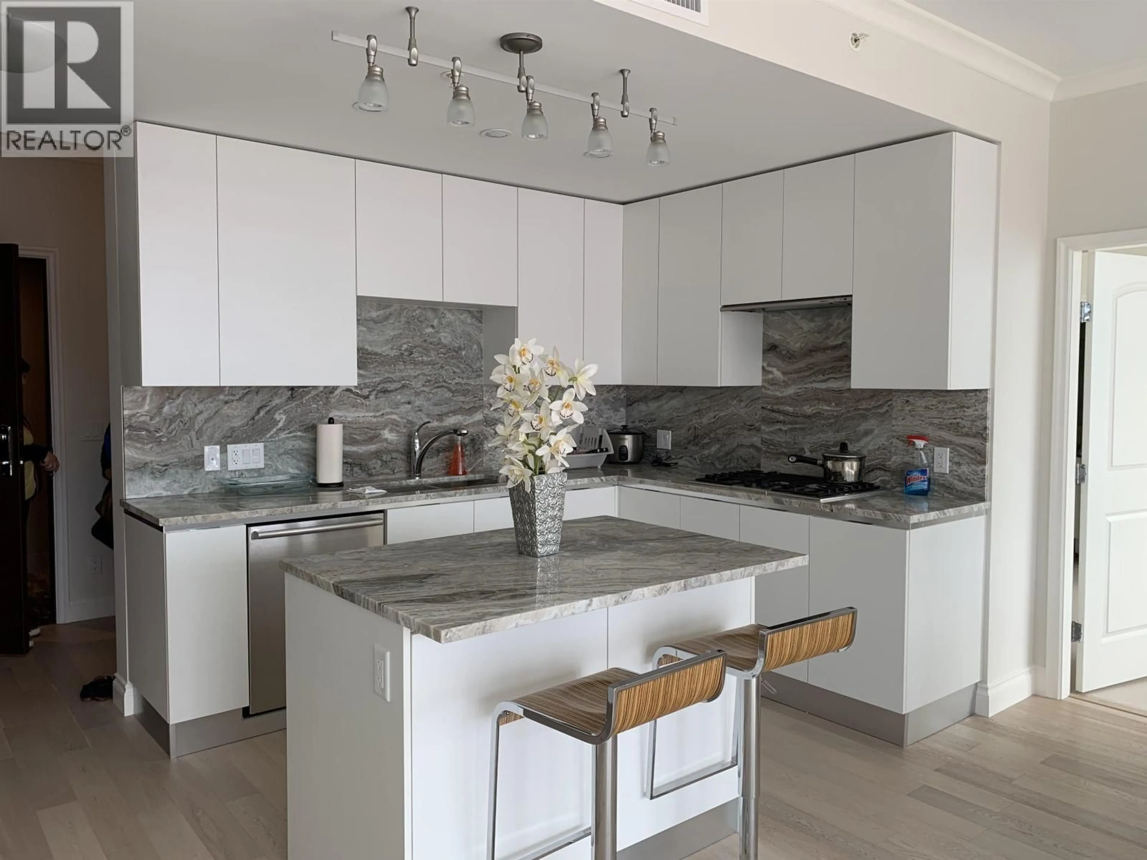 Contemporary kitchen, ceramic/tile floor for 807 - 175 VICTORY SHIP WAY, Vancouver British Columbia V7L0G1