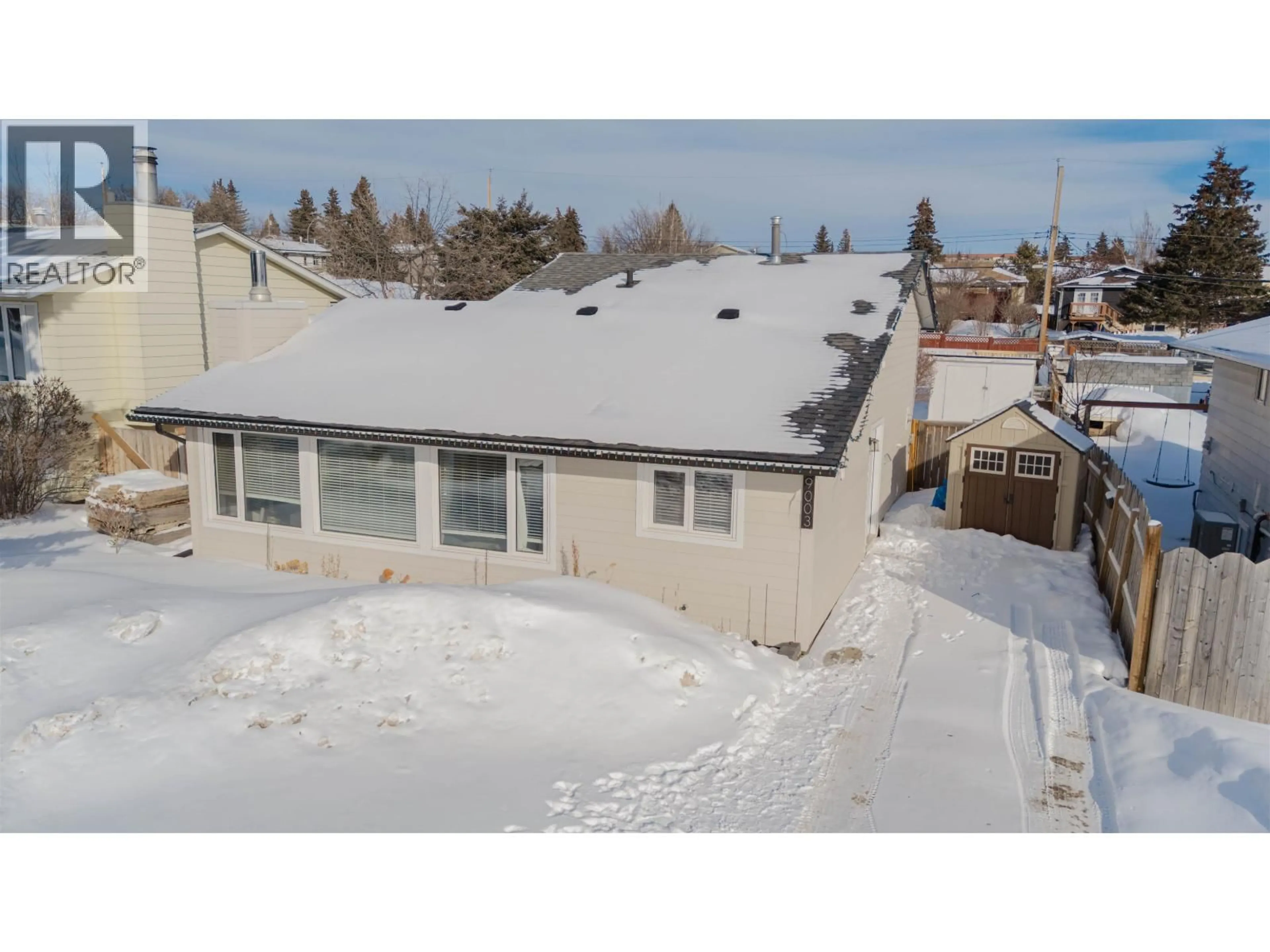 A pic from outside/outdoor area/front of a property/back of a property/a pic from drone, street for 9003 89 STREET, Fort St. John British Columbia V1J5B9