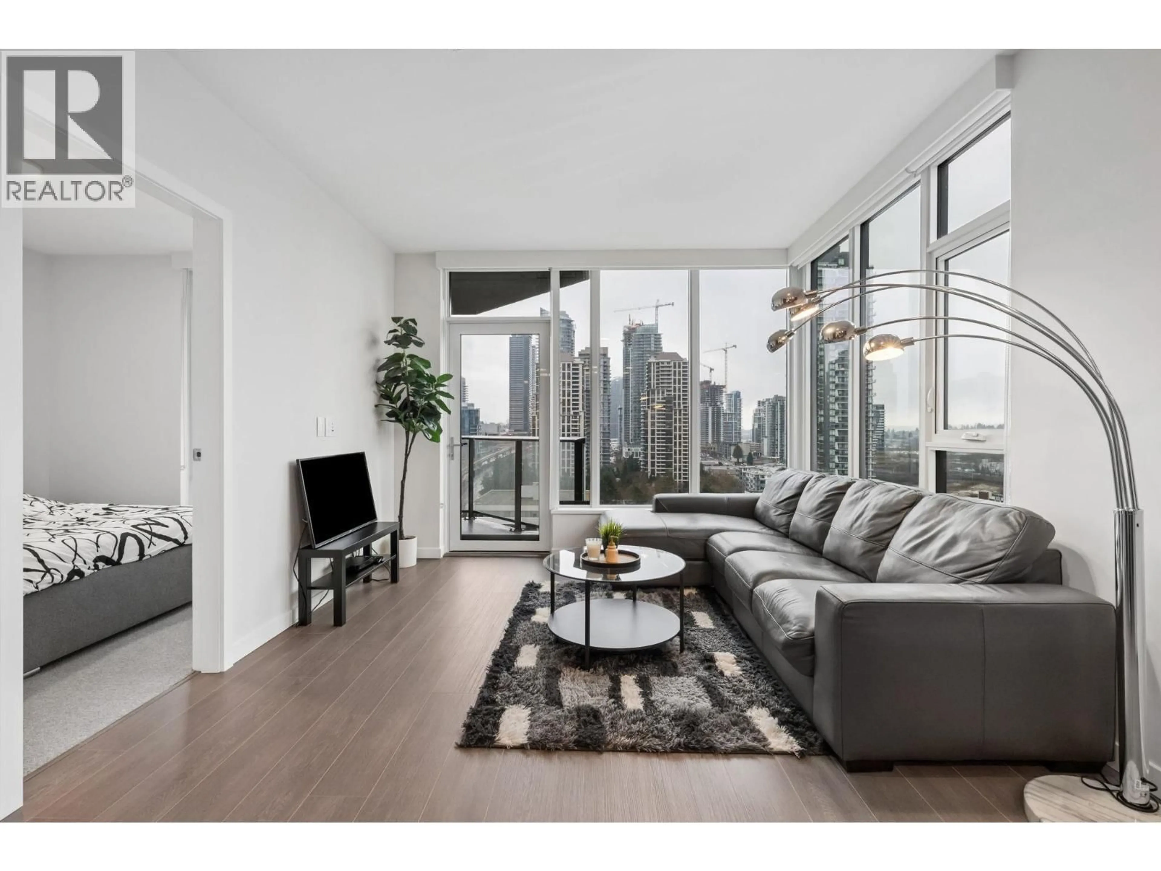 Living room with furniture, unknown for 1410 - 4168 LOUGHEED HIGHWAY, Burnaby British Columbia V5C0N9