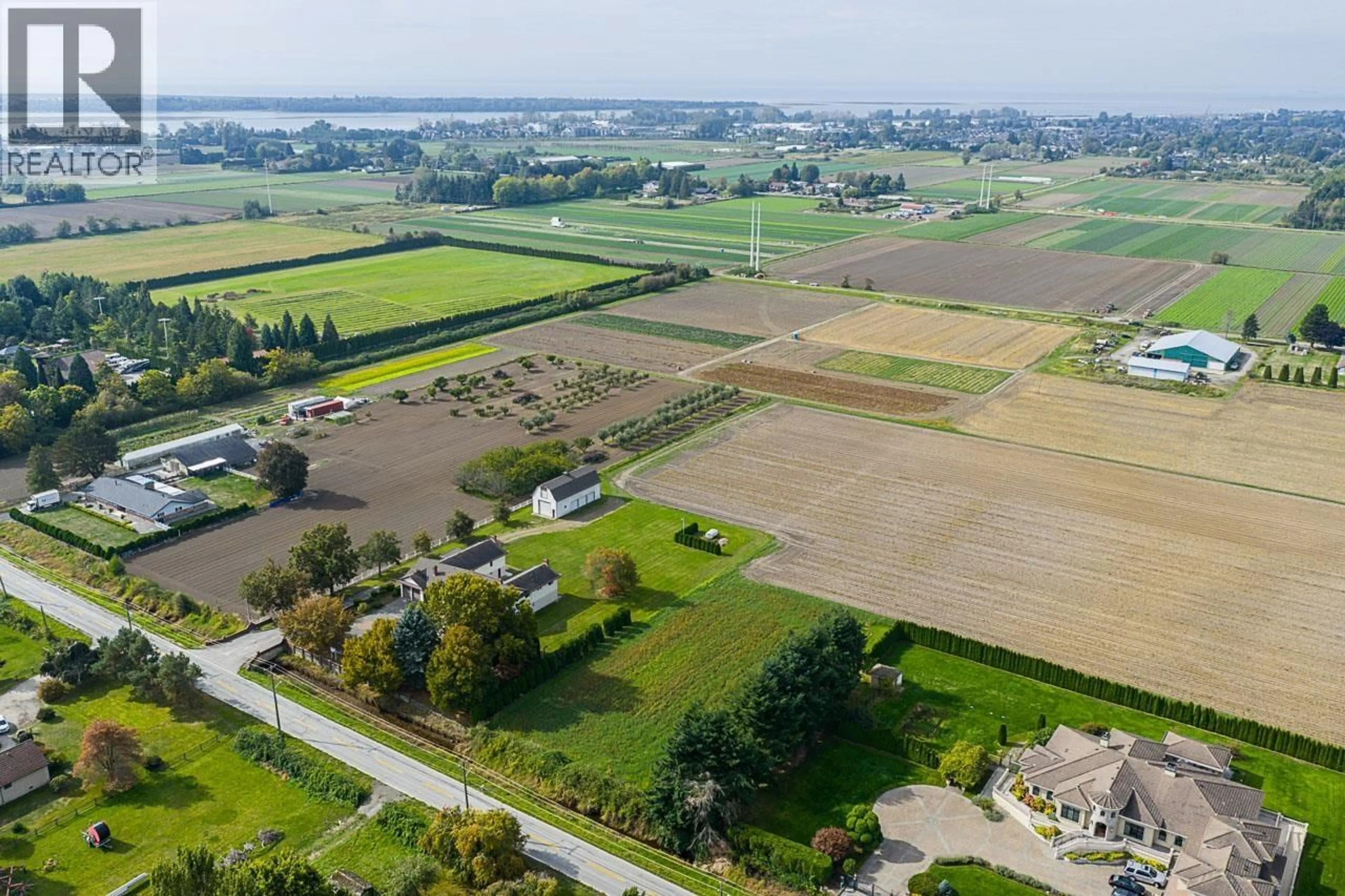 A pic from outside/outdoor area/front of a property/back of a property/a pic from drone, unknown for 11871 NO. 3 ROAD, Richmond British Columbia V7A1X3