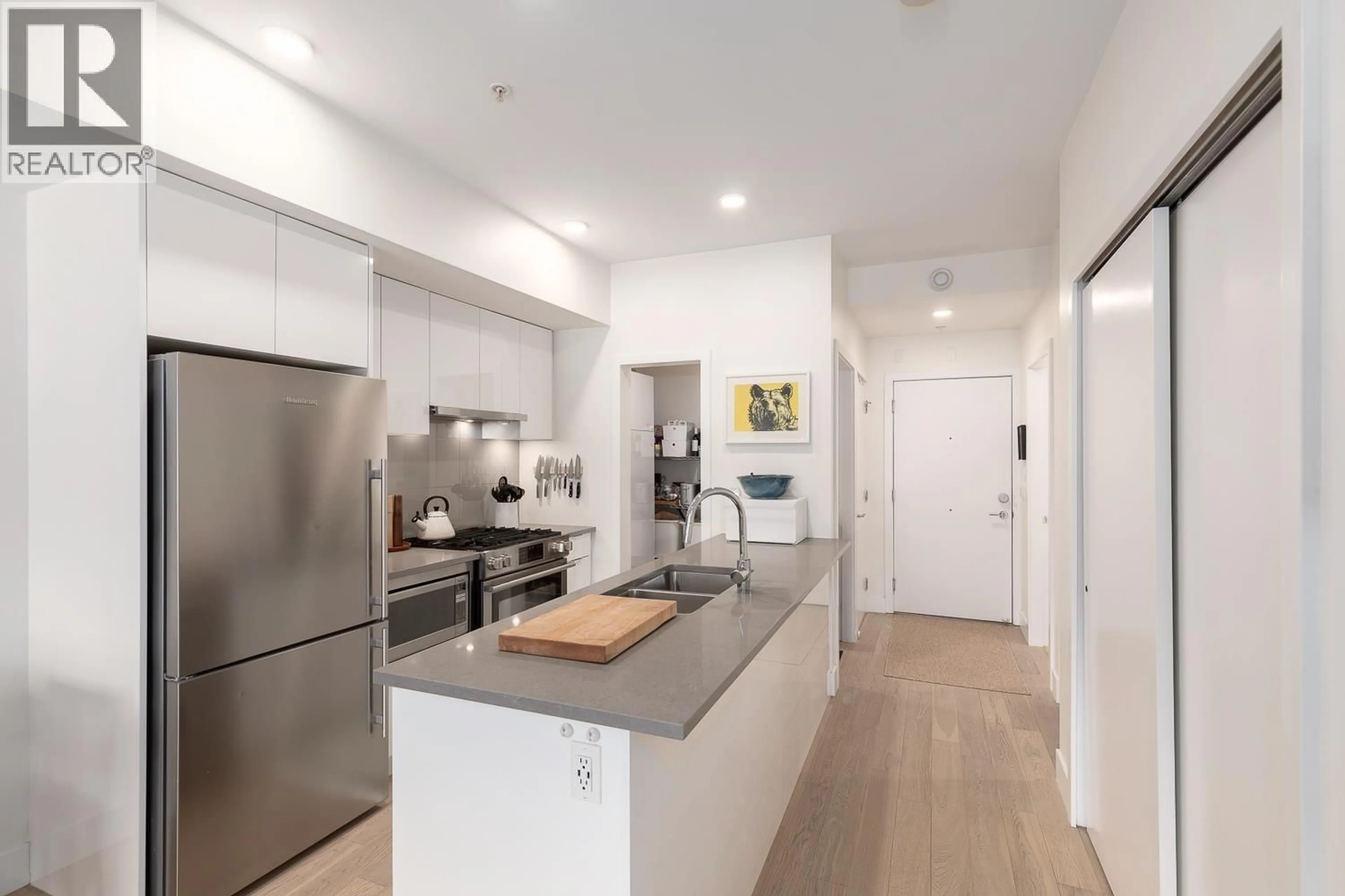 Open concept kitchen, unknown for 305 - 2666 DUKE STREET, Vancouver British Columbia V5R4S9