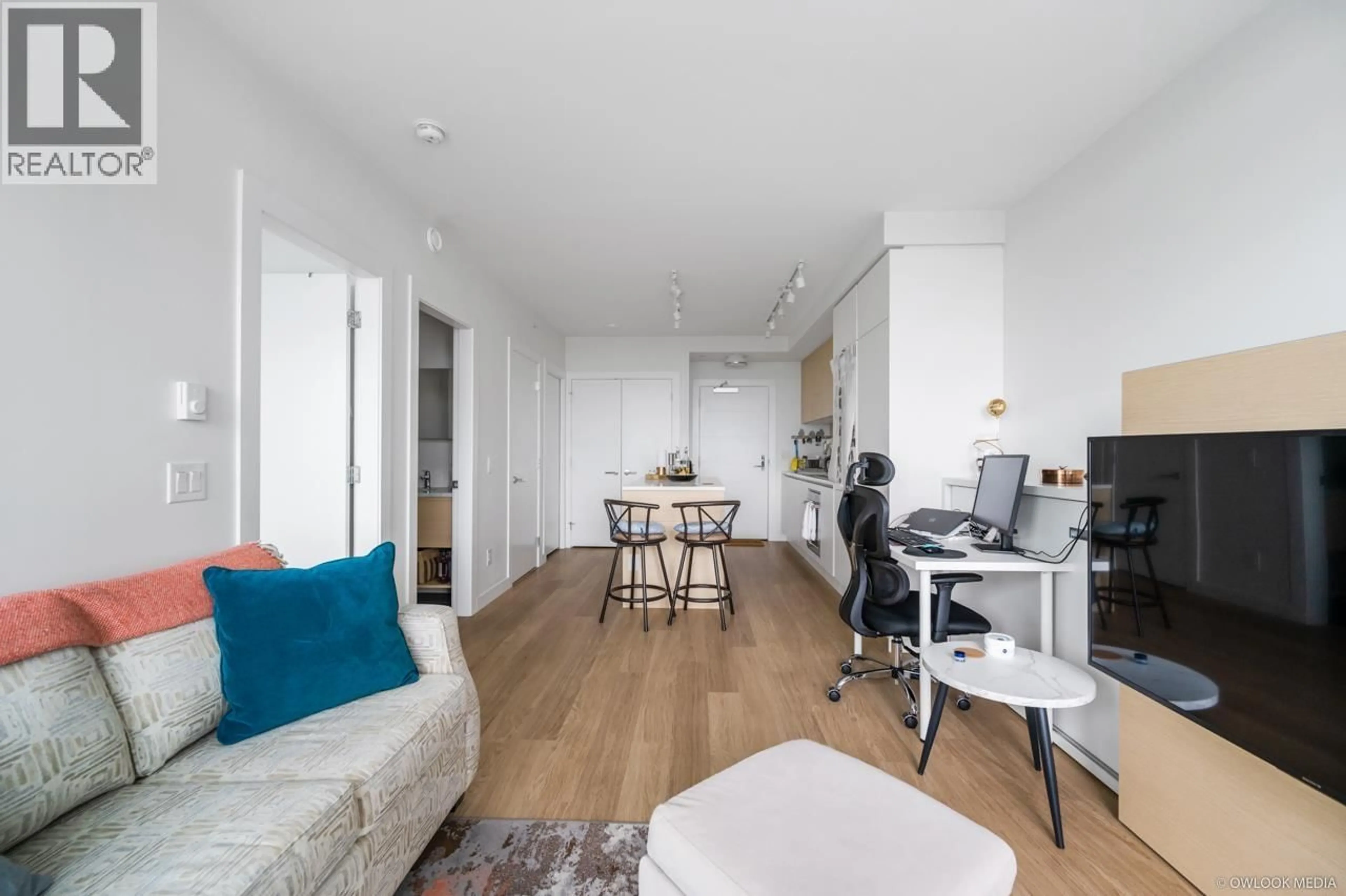 Living room with furniture, wood/laminate floor for 1310 - 525 FOSTER AVENUE, Coquitlam British Columbia V3J0H6