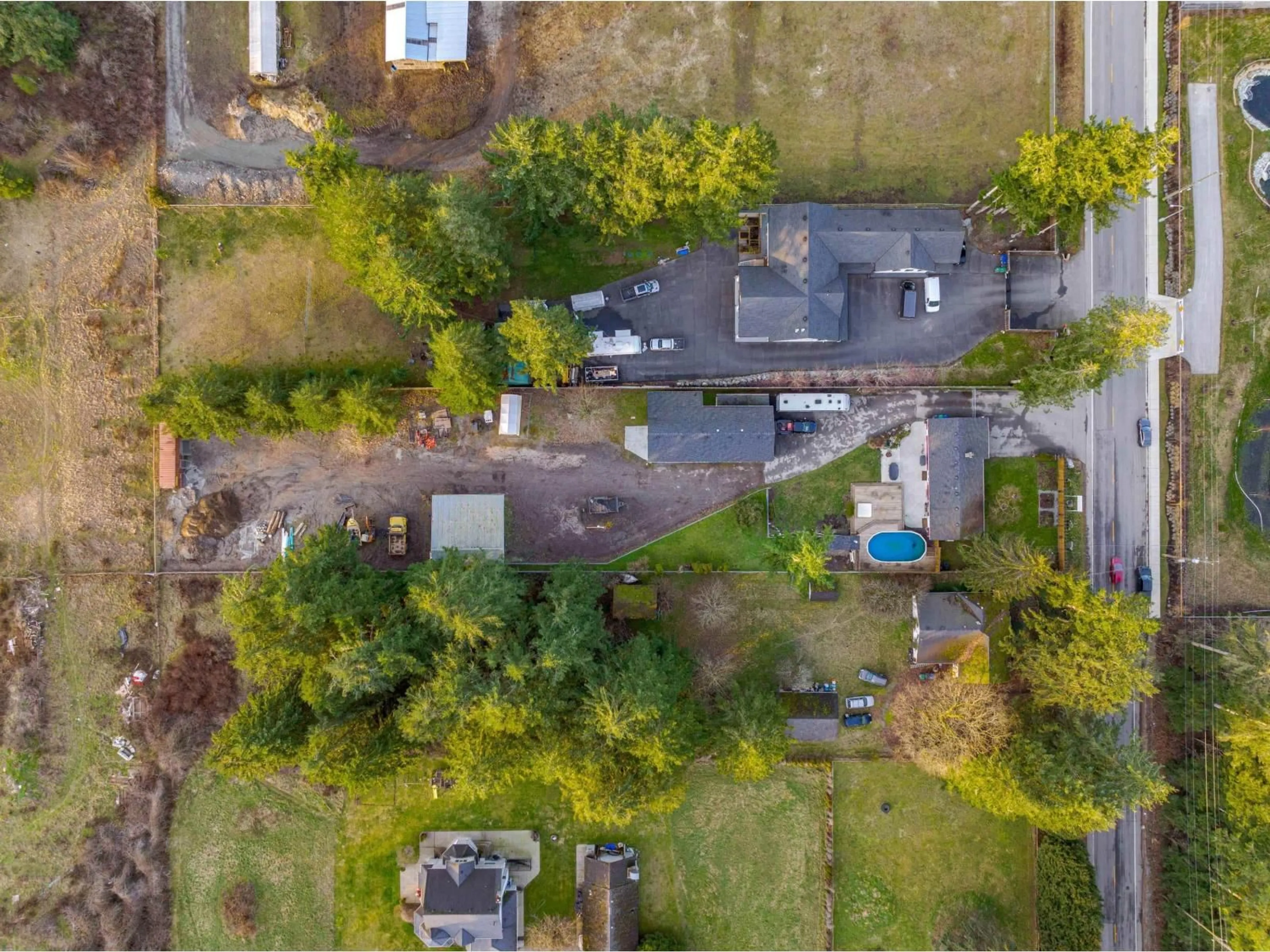 A pic from outside/outdoor area/front of a property/back of a property/a pic from drone, street for 3283 196 STREET, Surrey British Columbia V3Z1A9