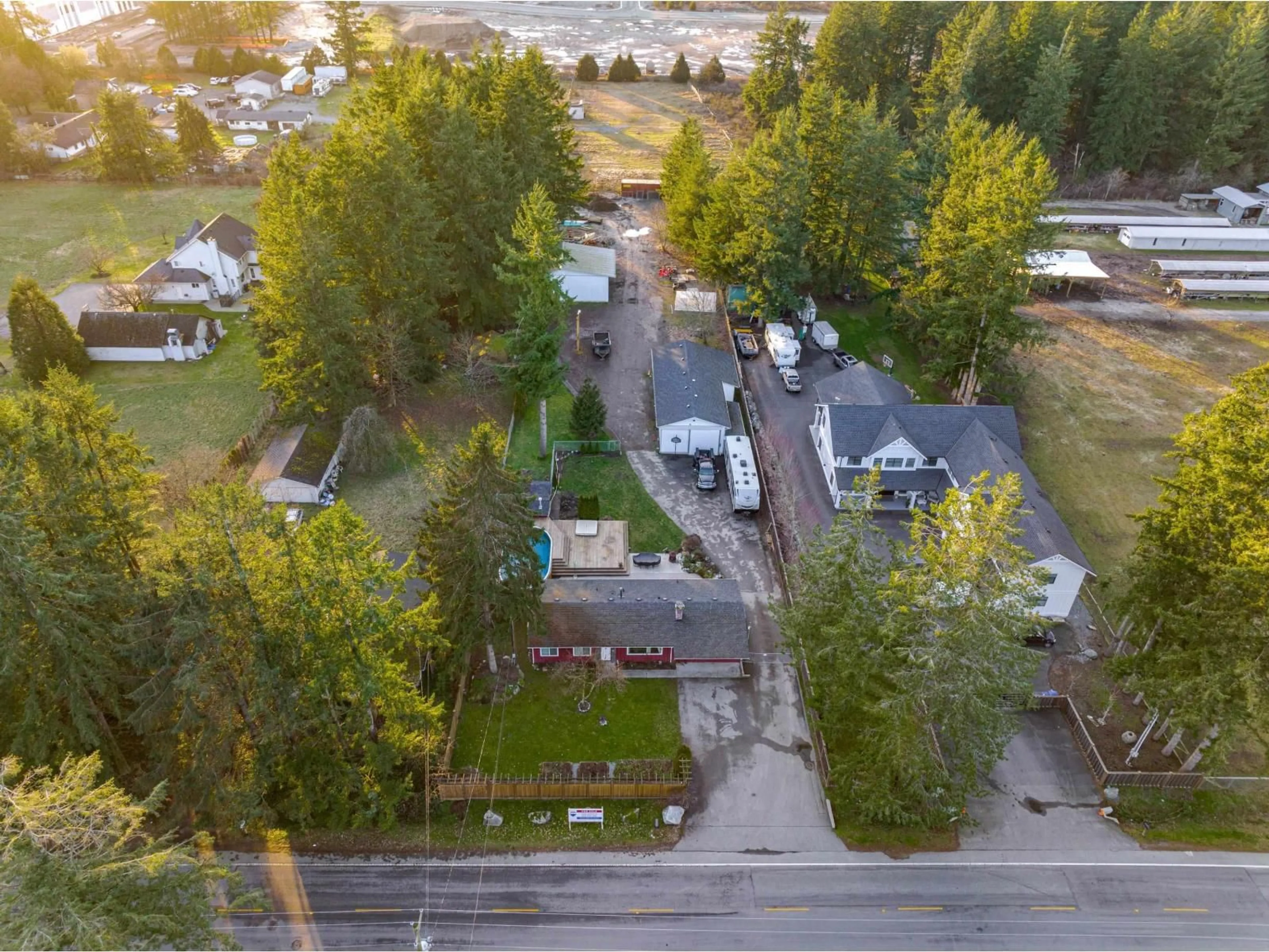 A pic from outside/outdoor area/front of a property/back of a property/a pic from drone, street for 3283 196 STREET, Surrey British Columbia V3Z1A9