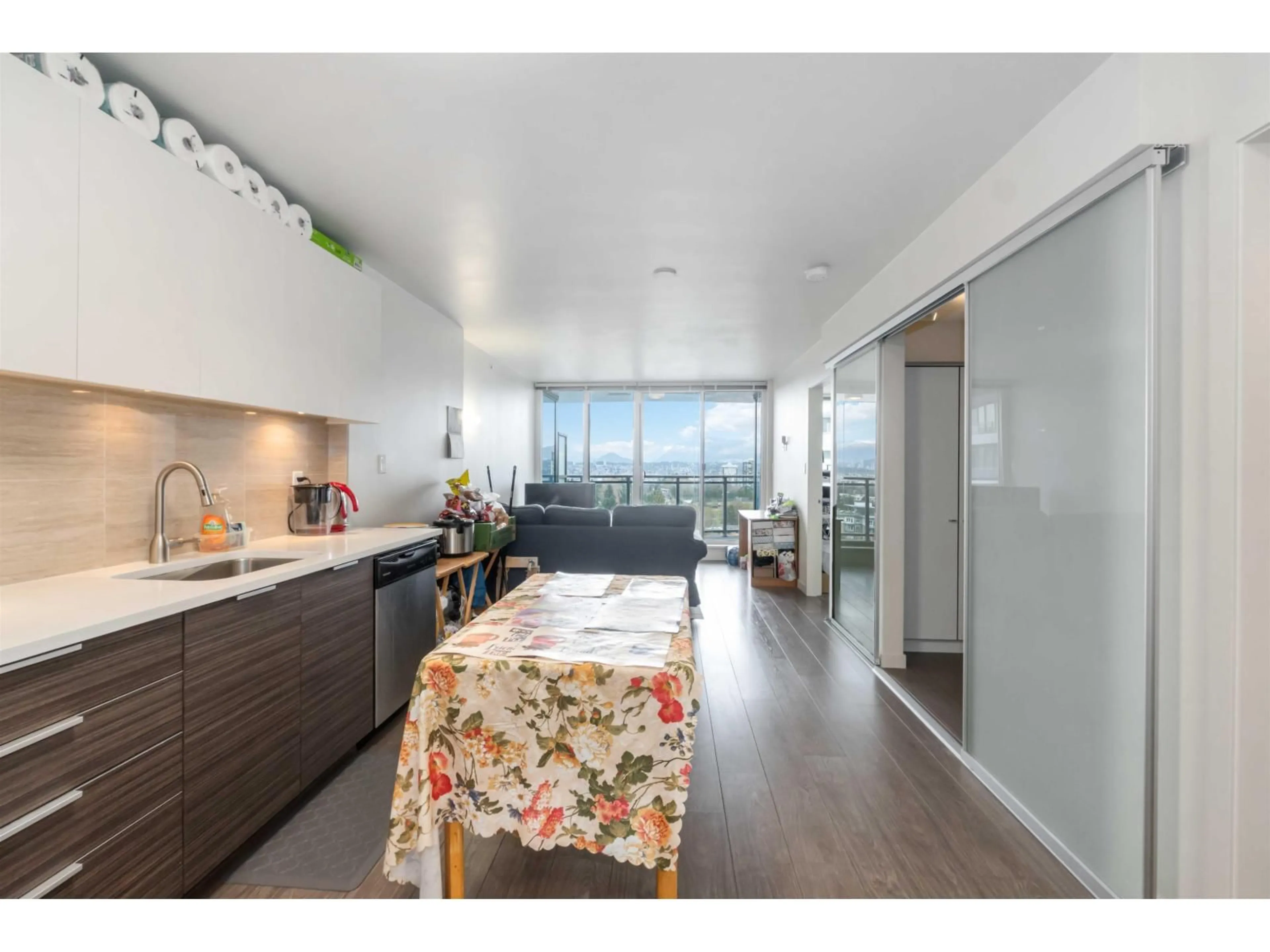 Open concept kitchen, wood/laminate floor for 1202 - 13303 CENTRAL AVENUE, Surrey British Columbia V3T0K6