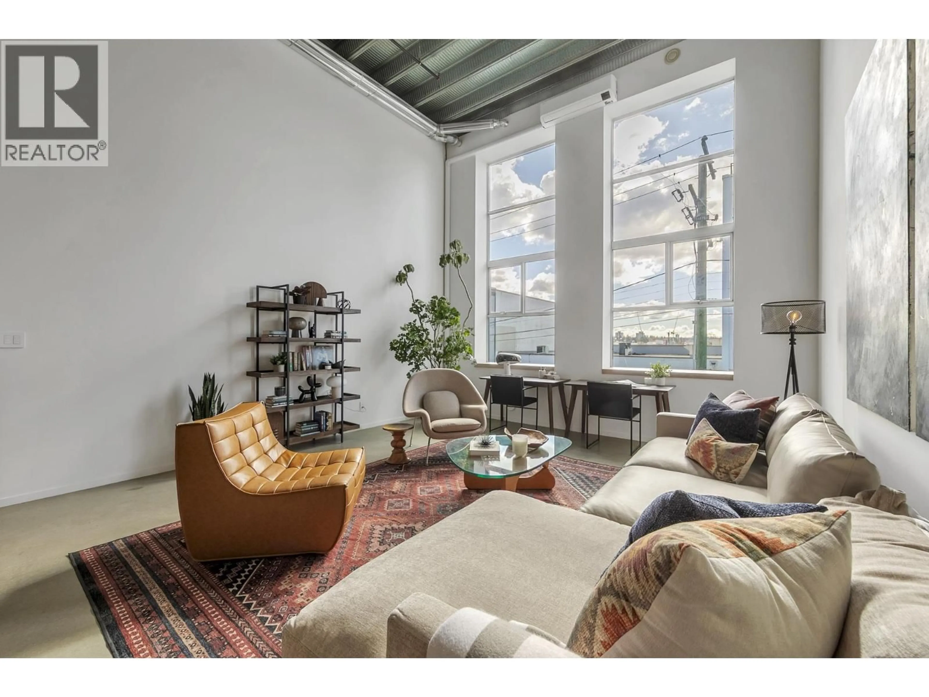 Living room with furniture, unknown for 215 - 1220 PENDER STREET, Vancouver British Columbia V6A1W8