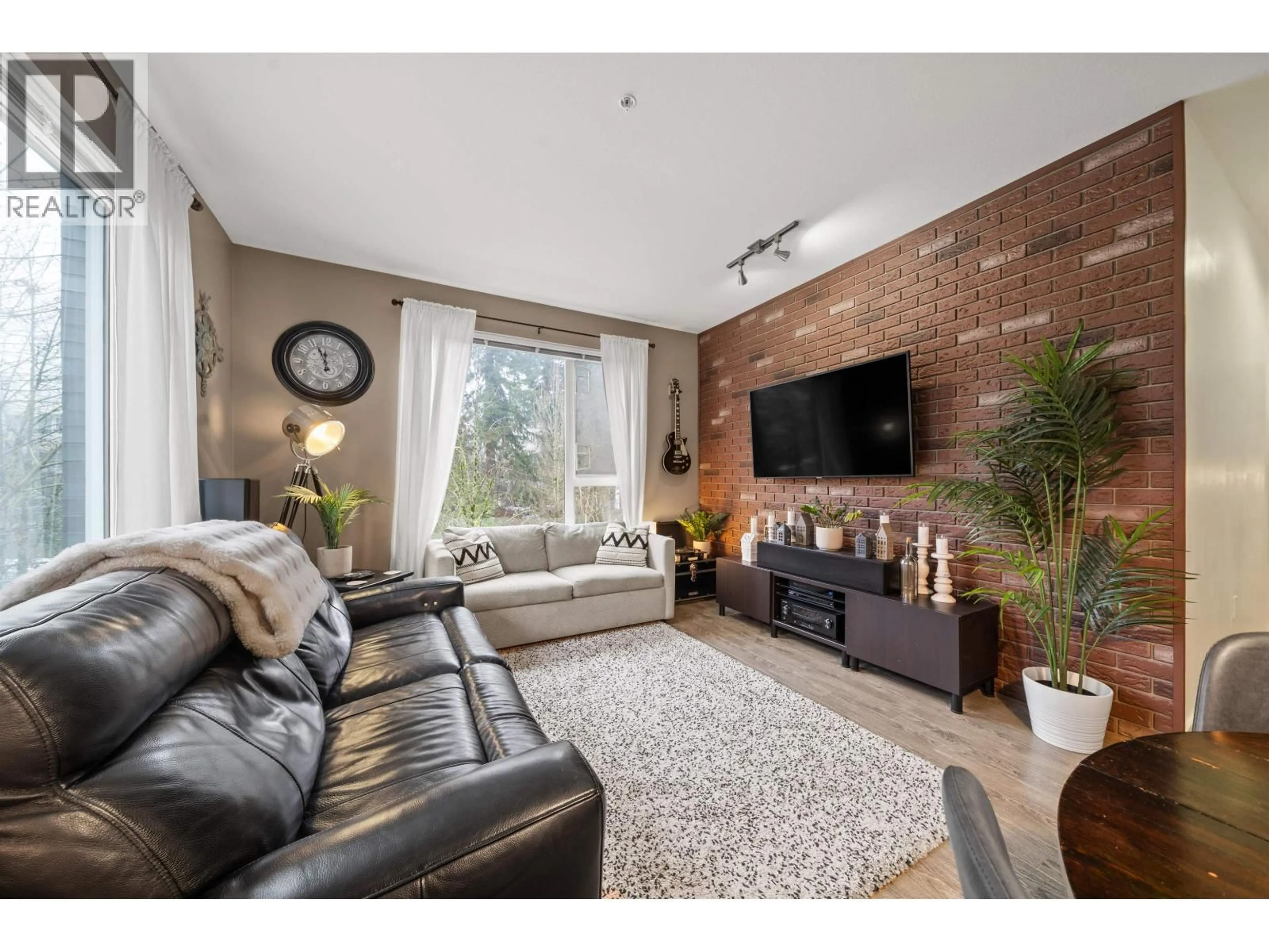 Living room with furniture, unknown for 516 - 9250 UNIVERSITY HIGH STREET, Burnaby British Columbia V5A0B3