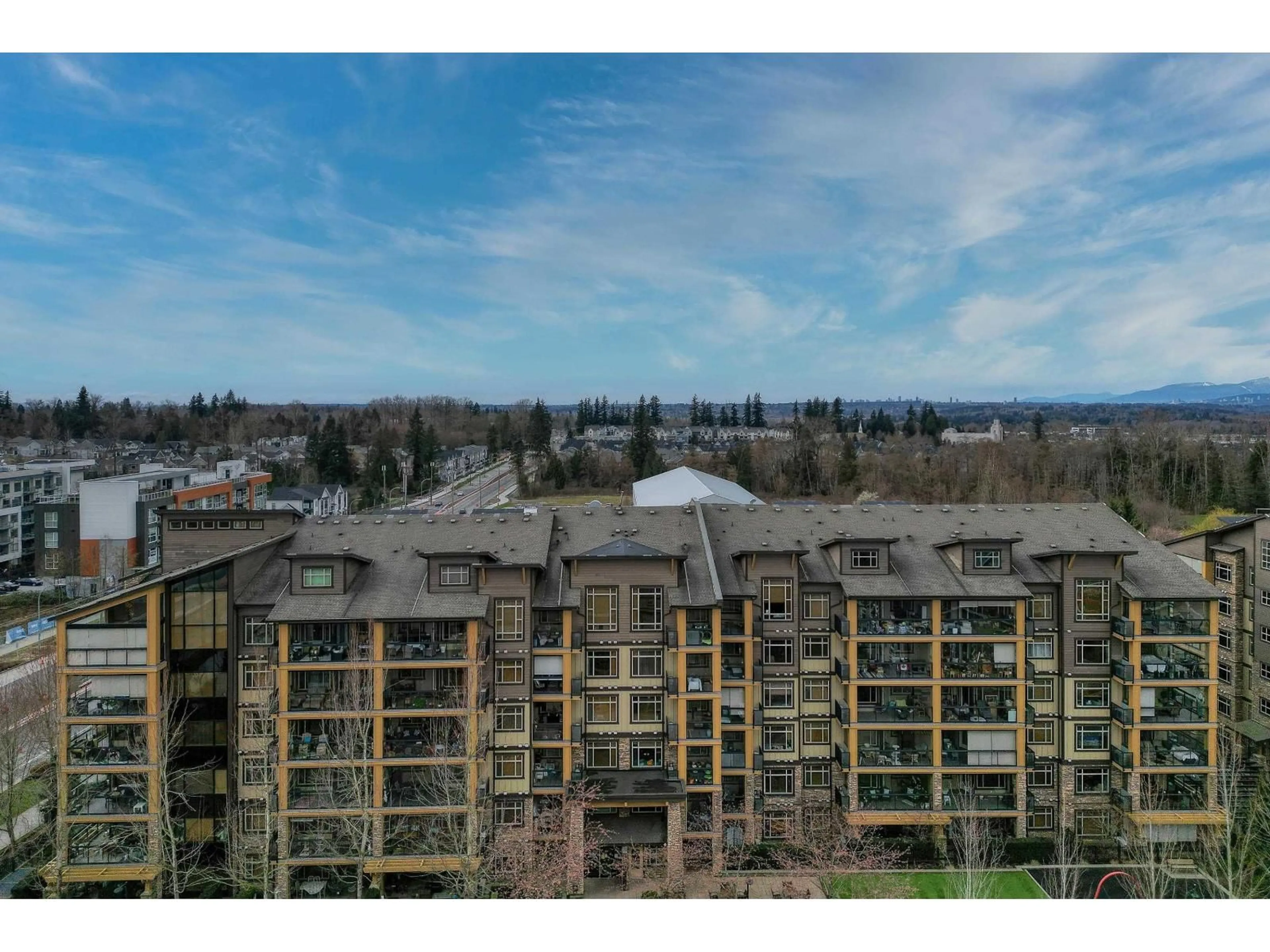 A pic from outside/outdoor area/front of a property/back of a property/a pic from drone, city buildings view from balcony for 207 - 8067 207 STREET, Langley British Columbia V2Y0N9