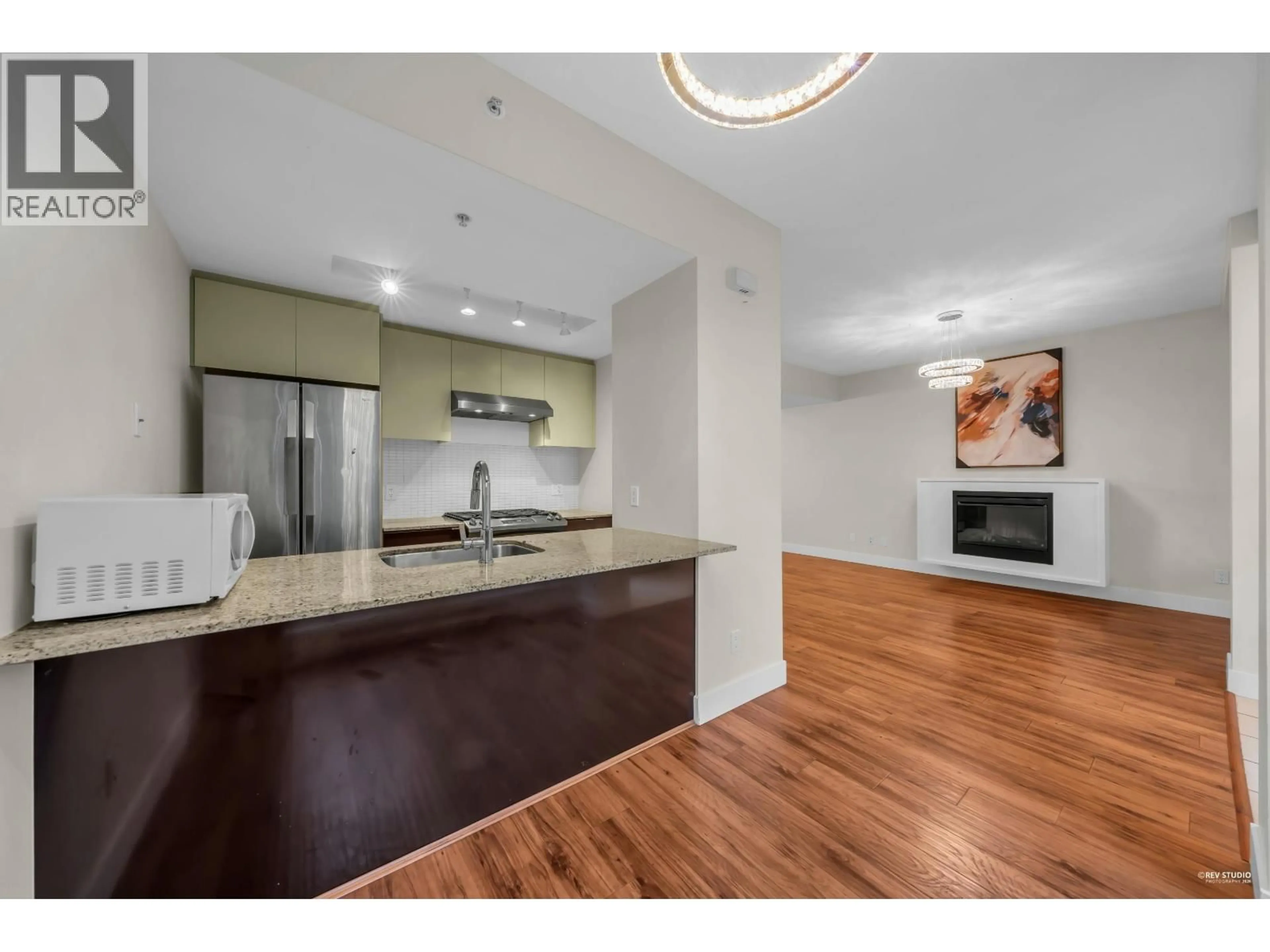 Open concept kitchen, wood/laminate floor for 4818 HAZEL STREET, Burnaby British Columbia V5H4T3