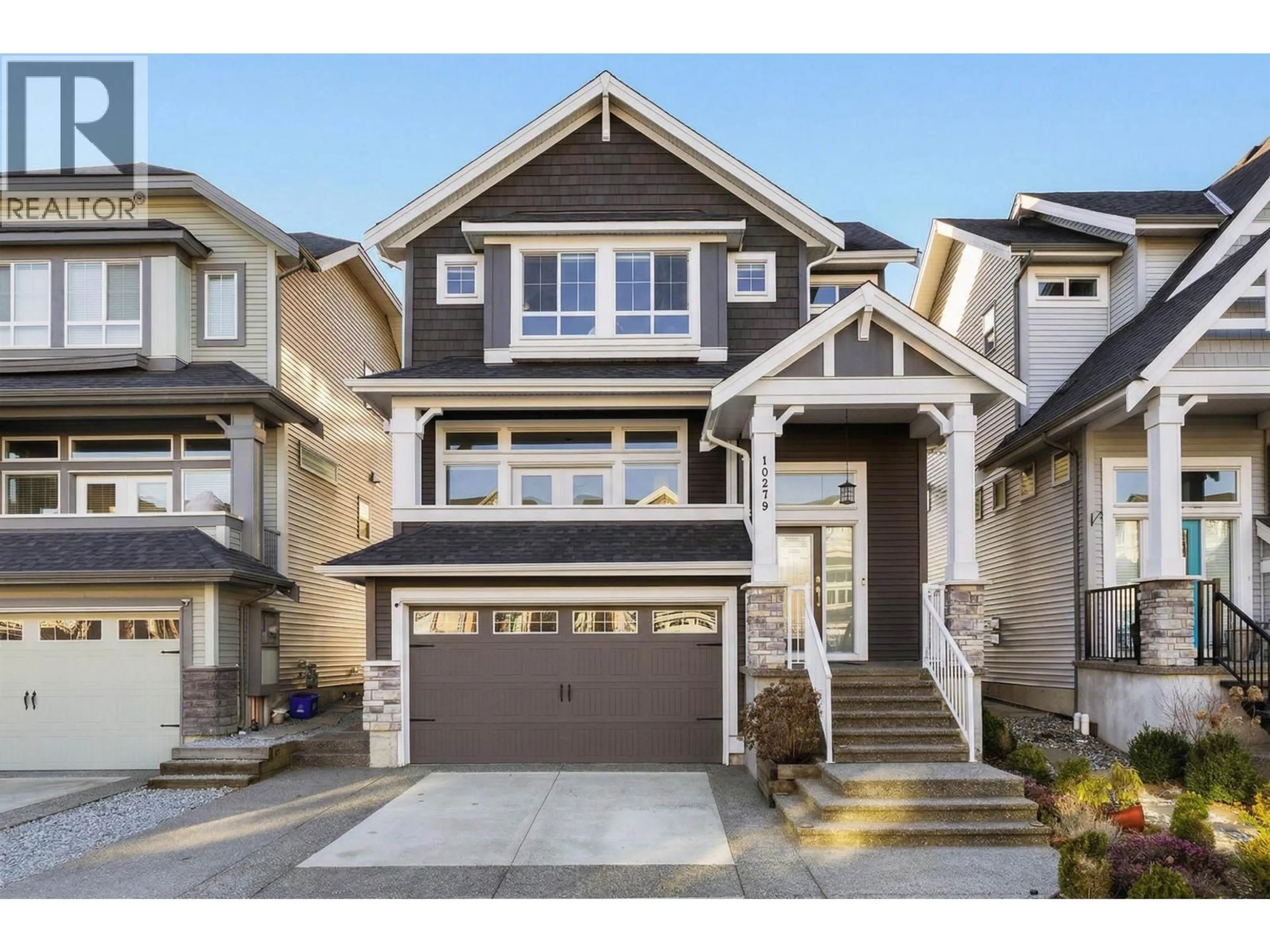 Home with vinyl exterior material, street for 10279 238A STREET, Maple Ridge British Columbia V2W1G3