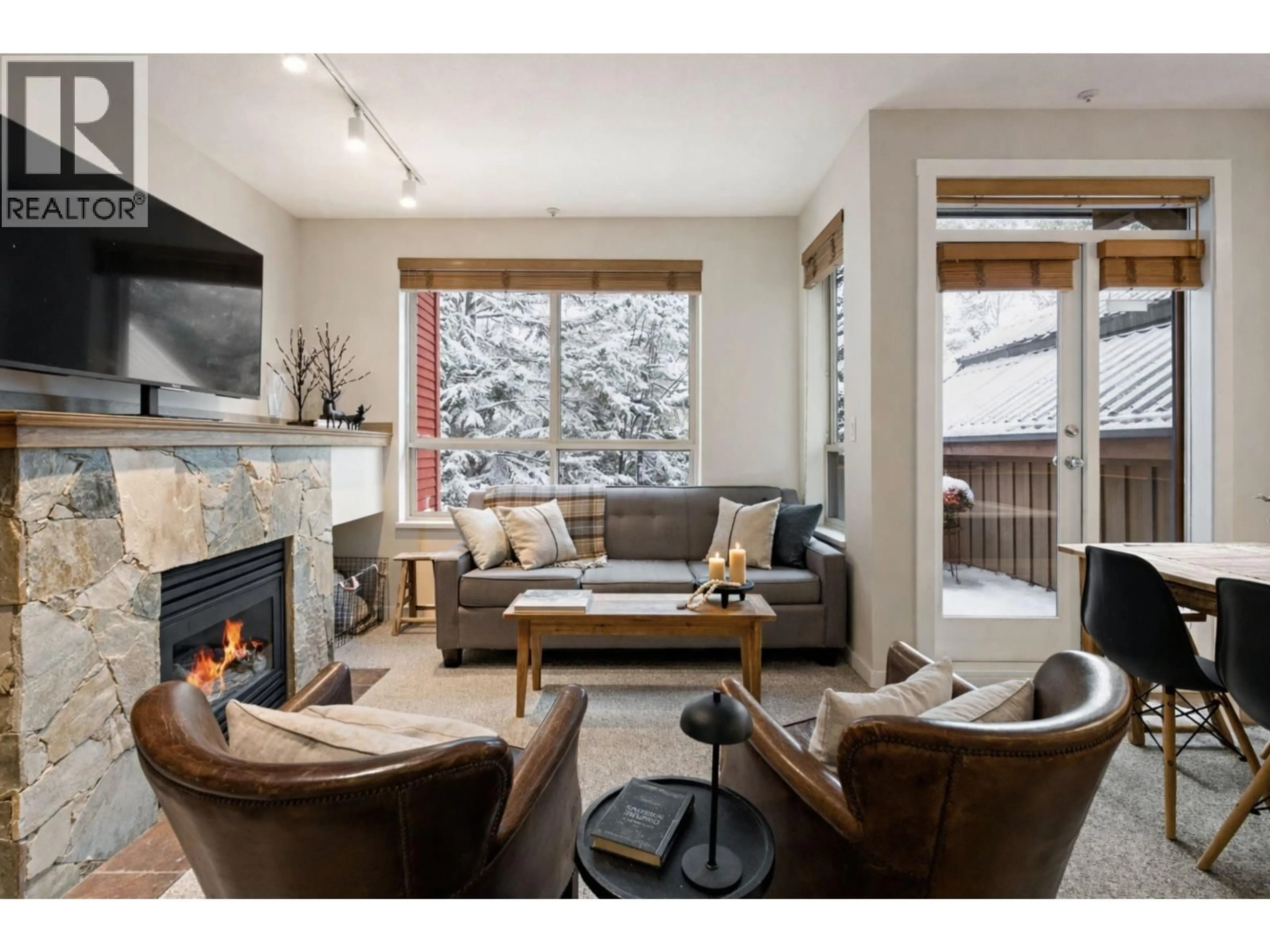 Living room with furniture, wood/laminate floor for 16 - 4385 NORTHLANDS BOULEVARD, Whistler British Columbia V8E1C5