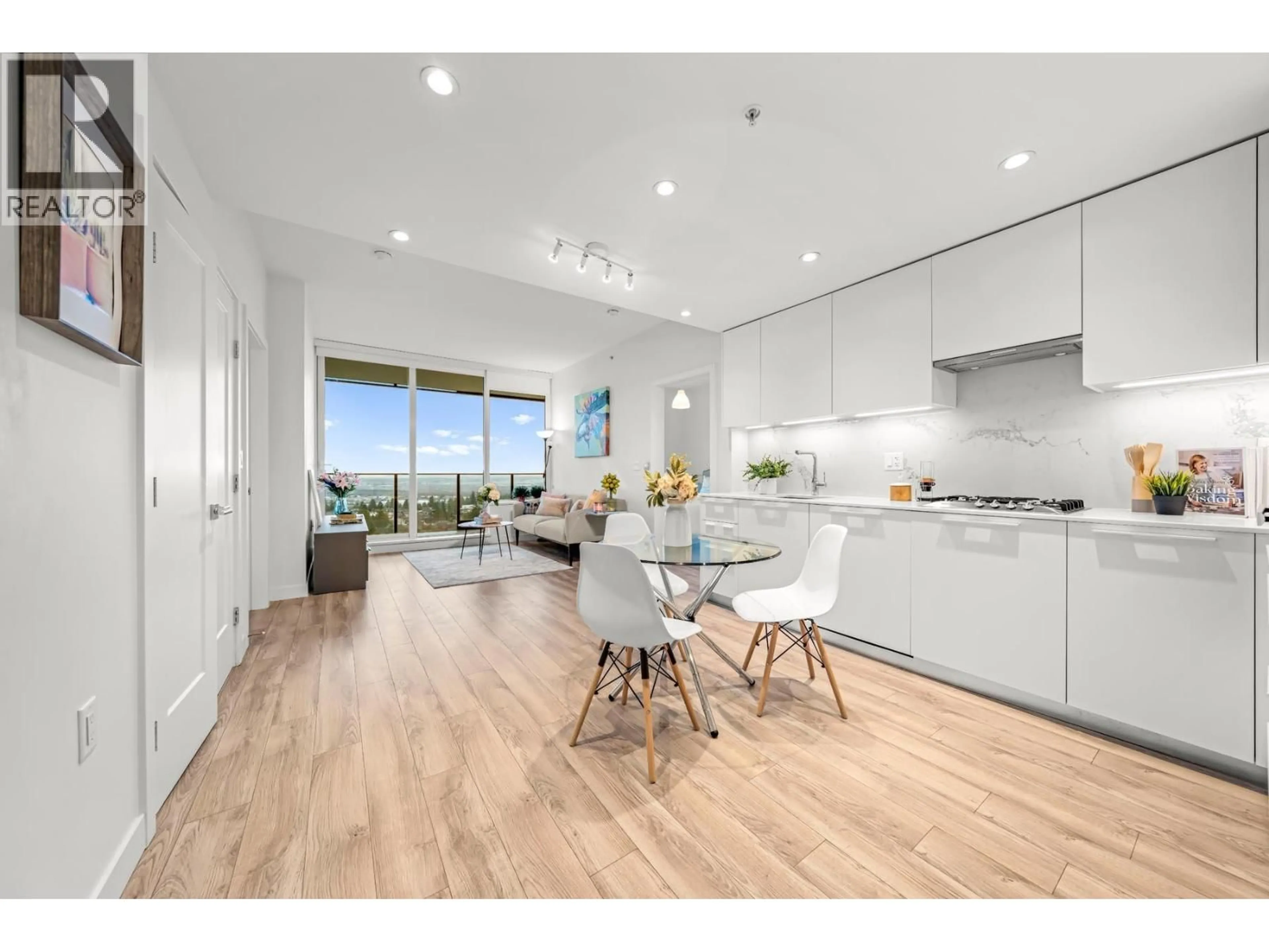 Open concept kitchen, wood/laminate floor for 1608 - 6699 DUNBLANE AVENUE, Burnaby British Columbia V5H0J8