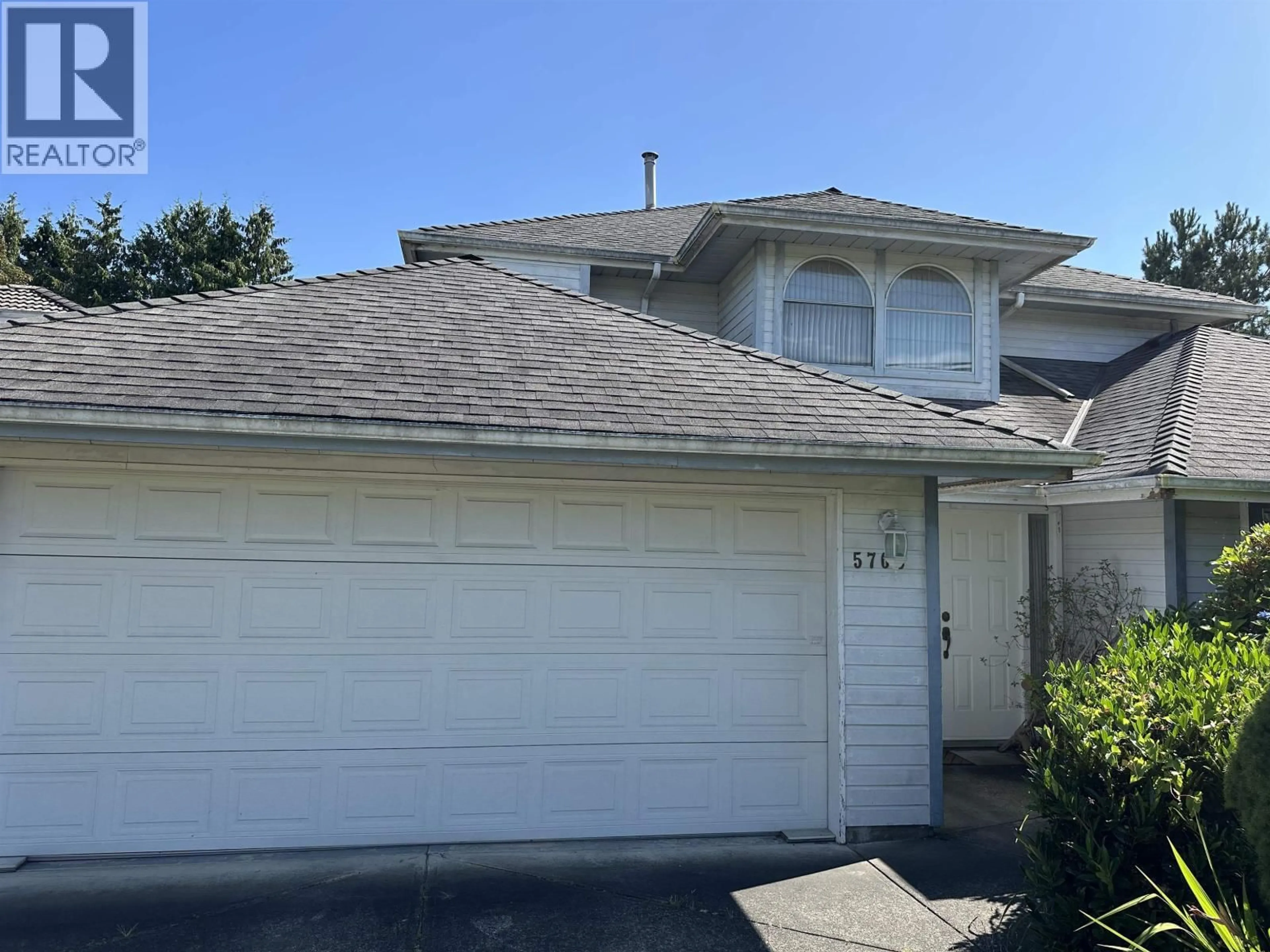 Home with vinyl exterior material, street for 5700 MAPLE ROAD, Richmond British Columbia V7E1G3