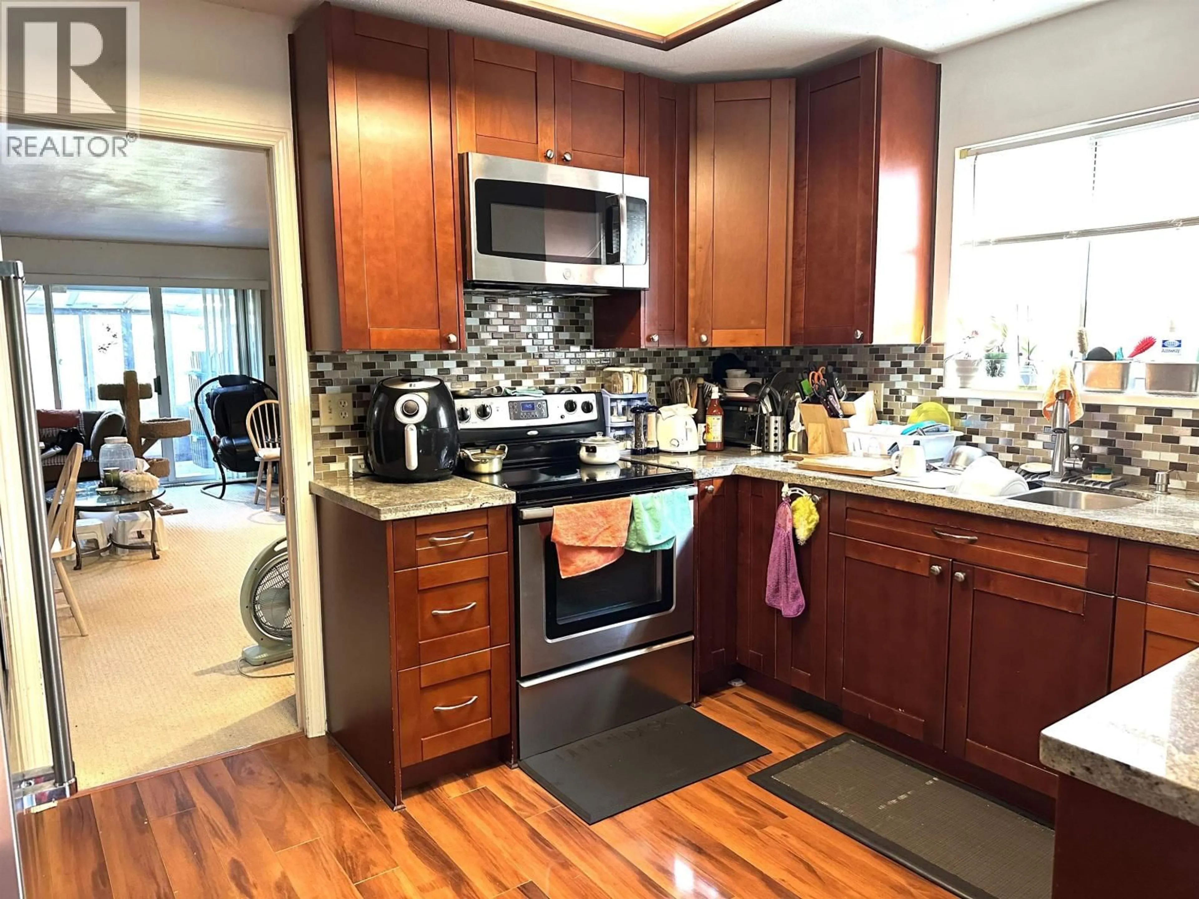 Open concept kitchen, unknown for 5700 MAPLE ROAD, Richmond British Columbia V7E1G3