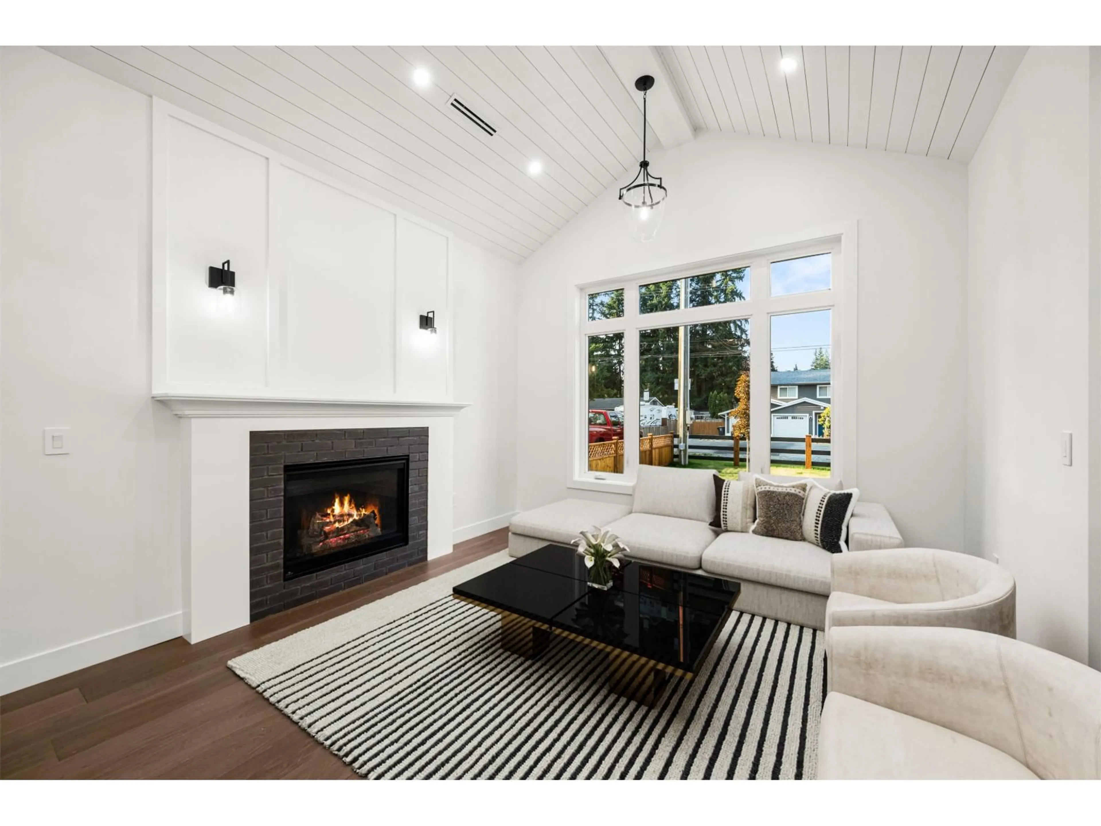 Living room with furniture, wood/laminate floor for 20334 42 AVENUE, Langley British Columbia V3A3A7